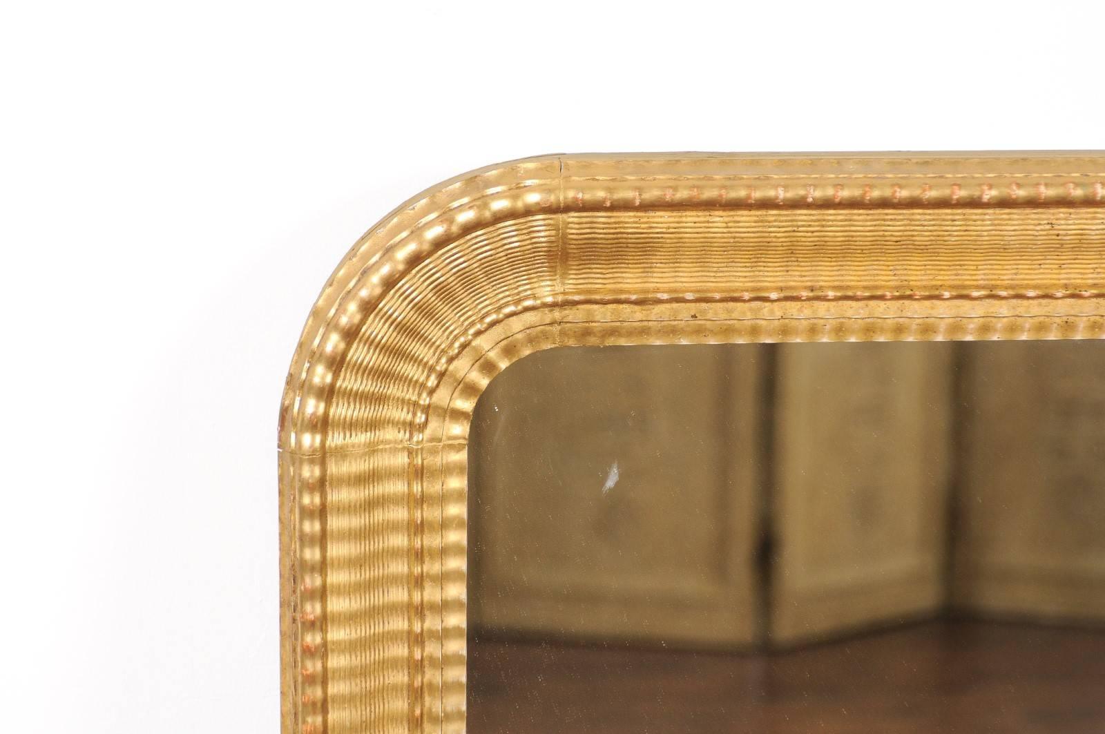 French Louis-Philippe Style Ridged Giltwood Mirror from the Early 20th Century 4