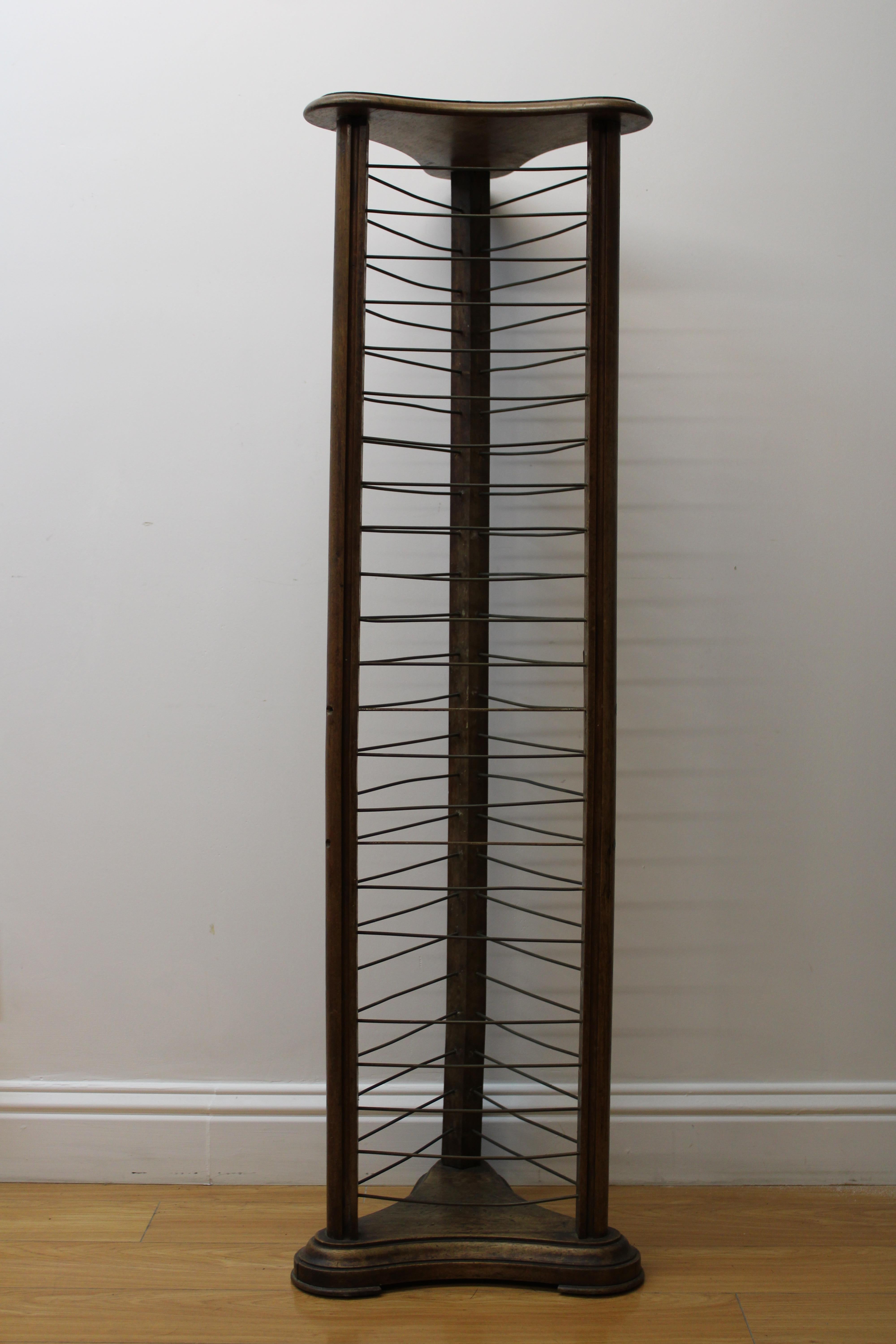 C. 19th Century.

French (Louis Philippe) style walnut corner plate rack w/brass holders.  Holds 24 plates (maximum size 9.5