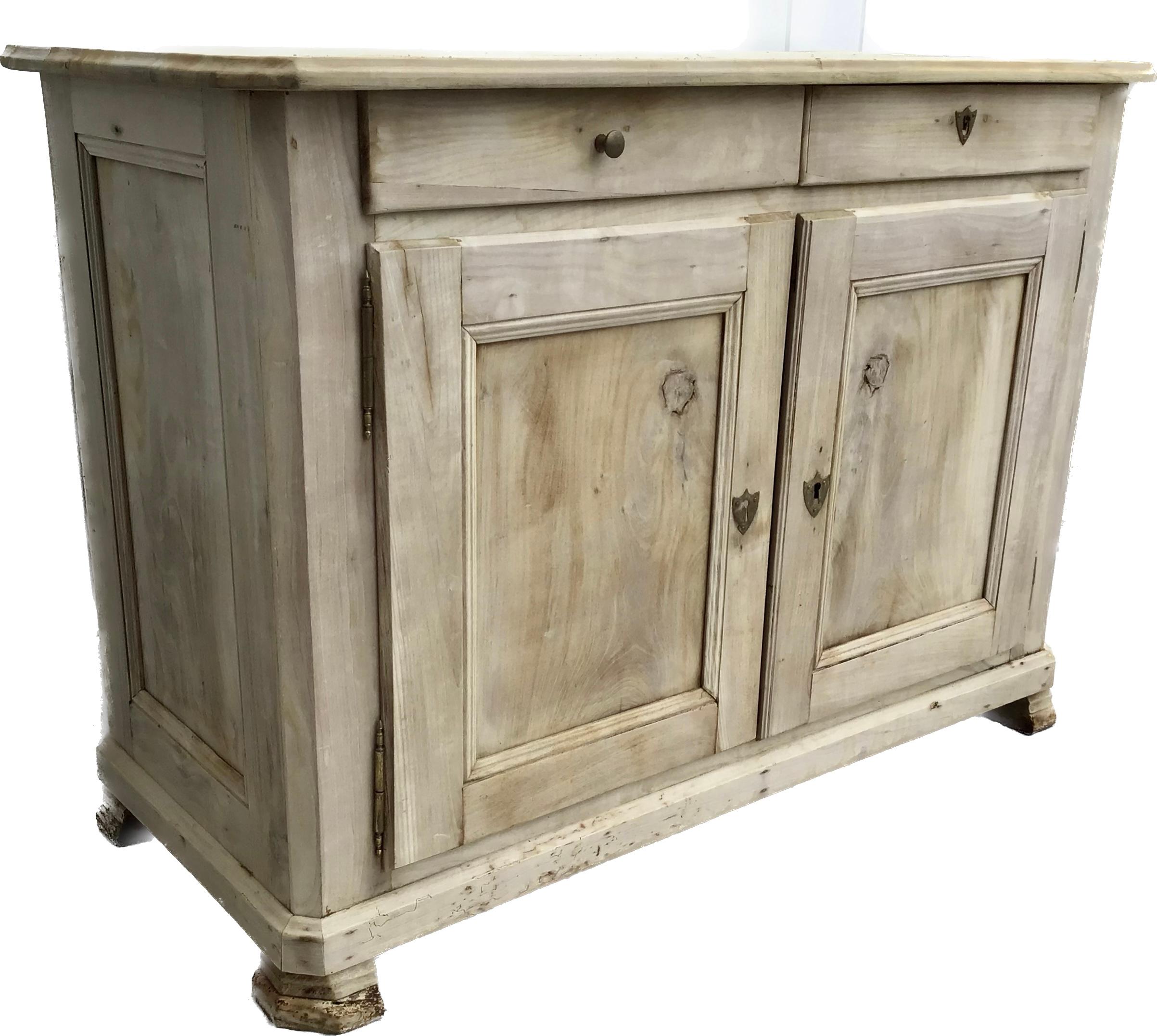 French buffet Louis Phillipe circa 1860. Beautiful bleached Cherry wood. Natural light warm patina. From France. Made of beautifully colored bleached out wood. Paneled sides. Two molded drawers and two paneled doors. Great proportions. Great patina.