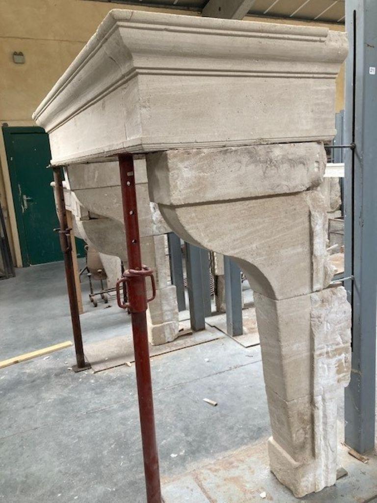 Carved French Louis XIII Limestone Fireplace Mantel For Sale