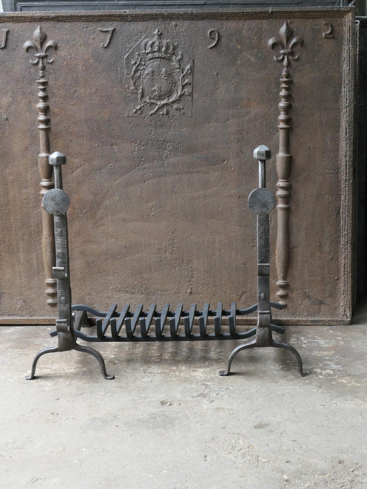 17th century French Louis XIII period fire grate. Made of beautifully forged and carved wrought iron period andirons with a recently forged grate. The condition is good.

The total width at the front of the grate is 77.5 cm / 30.5 inches.





 