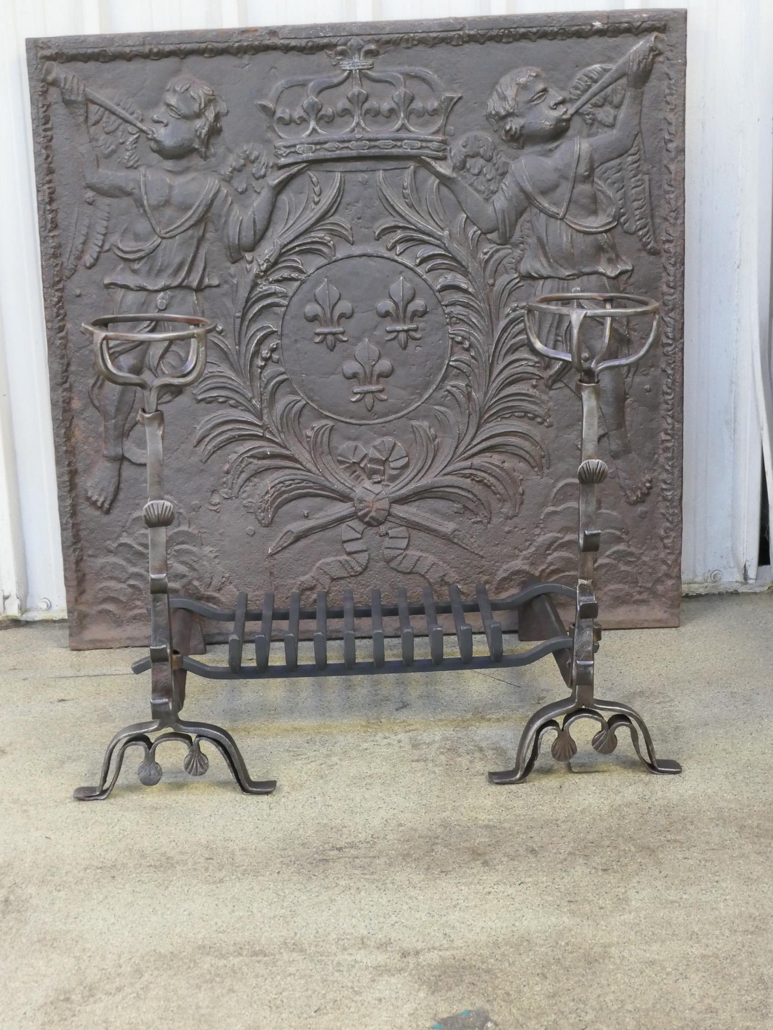 17th century French Louis XIII period fire grate. Made of beautifully forged  and carved wrought iron period andirons with a recently forged grate. The condition is good.







 