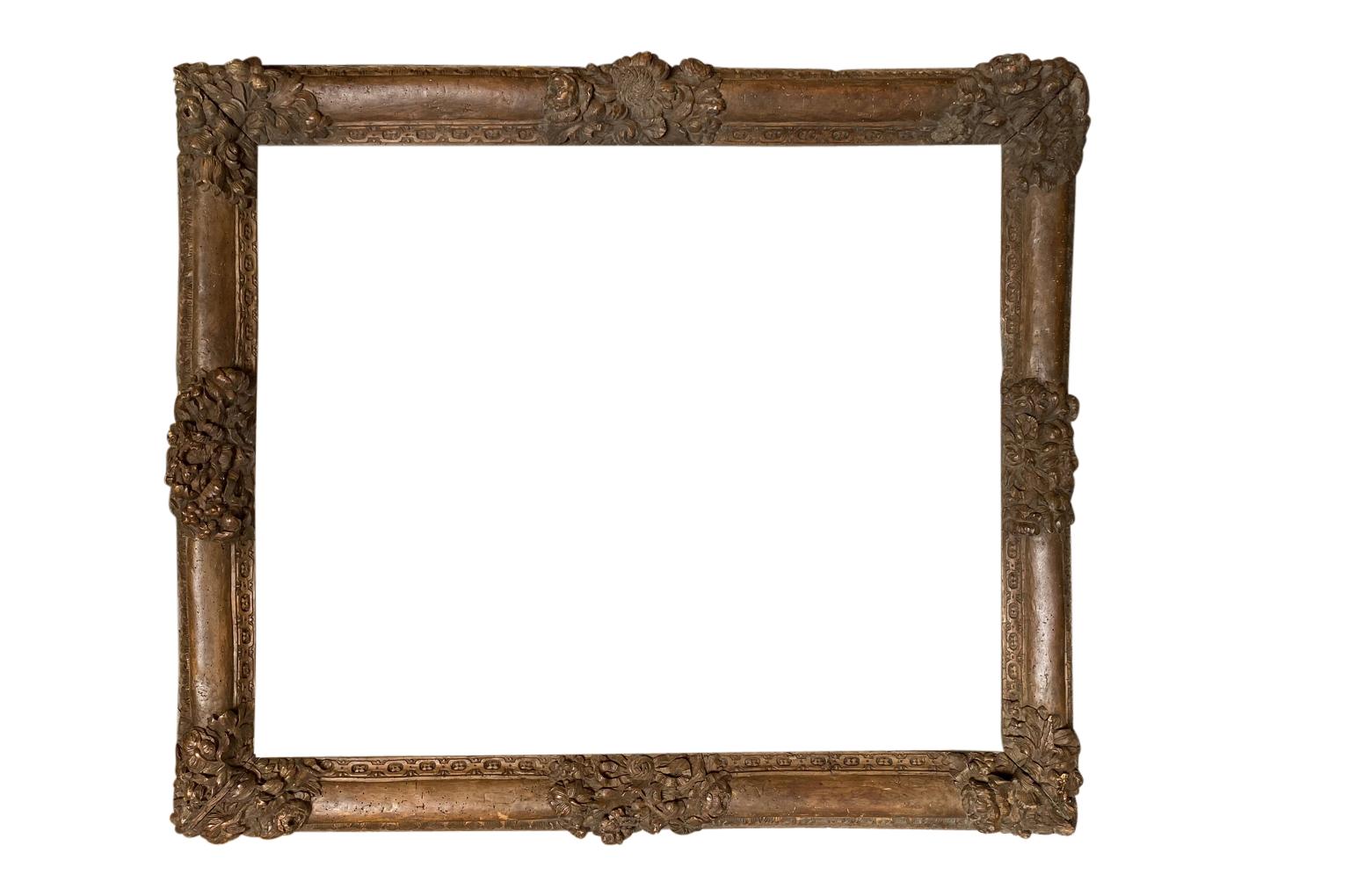 A very striking period Louis XIII frame from the Provence region of France. Beautifully crafted from carved walnut. Lovely patina. Perfect to house a piece of art or to convert into a mirror.