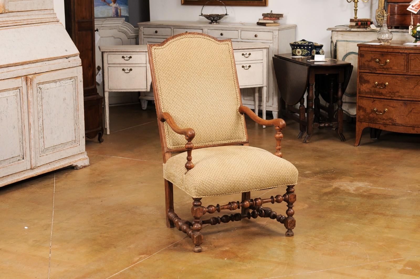 Carved French Louis XIII Style 19th Century Walnut Armchair with Turned Base For Sale