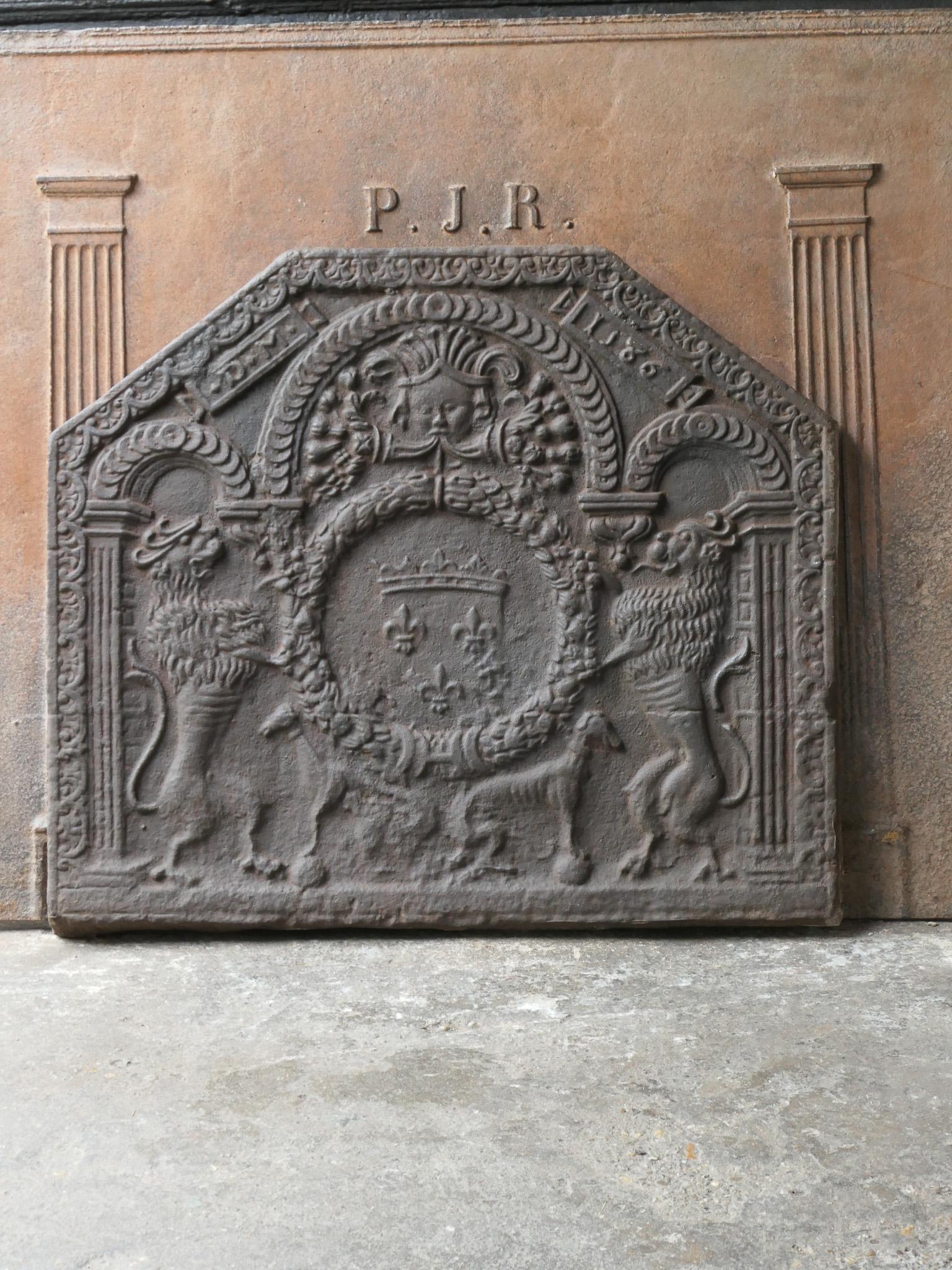 French Louis XIII style fireback with the Arms of France. A coat of arms of the House of Bourbon, an originally French royal house that became a major dynasty in Europe. The house delivered kings for Spain (Navarra), France, both Sicilies and Parma.