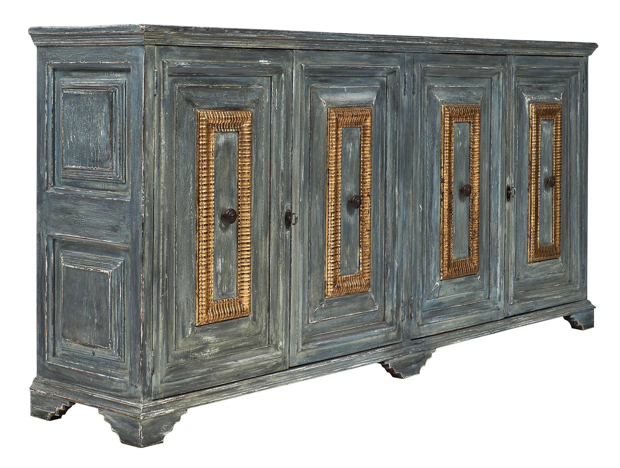 Louis XIII style French buffet of painted and gold leafed fir. There are four doors with forged iron handles and original locks and keys in working condition.