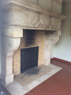 French Louis XIII Style Fireplace in Limestone, 18th Century, Lorraine, France.