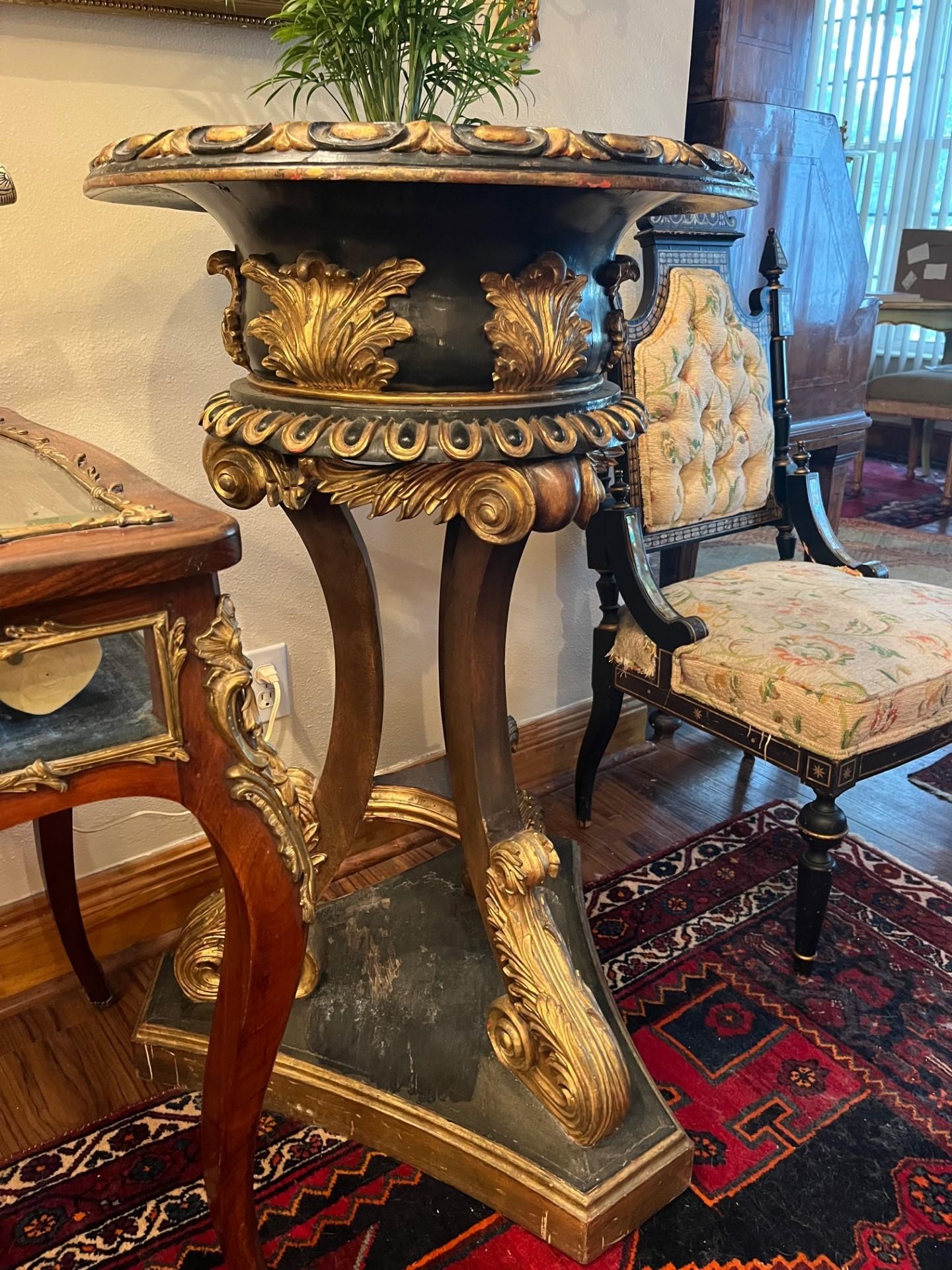 Scottish Regency Style Pair Ebonized Giltwood Palatial Jardinieres Sotheby’s Provenance.

Fabulous and incredibly elaborate Scottish Regency style hand carved pair of palatial jardinieres. These plant stands are handcrafted by highly talented