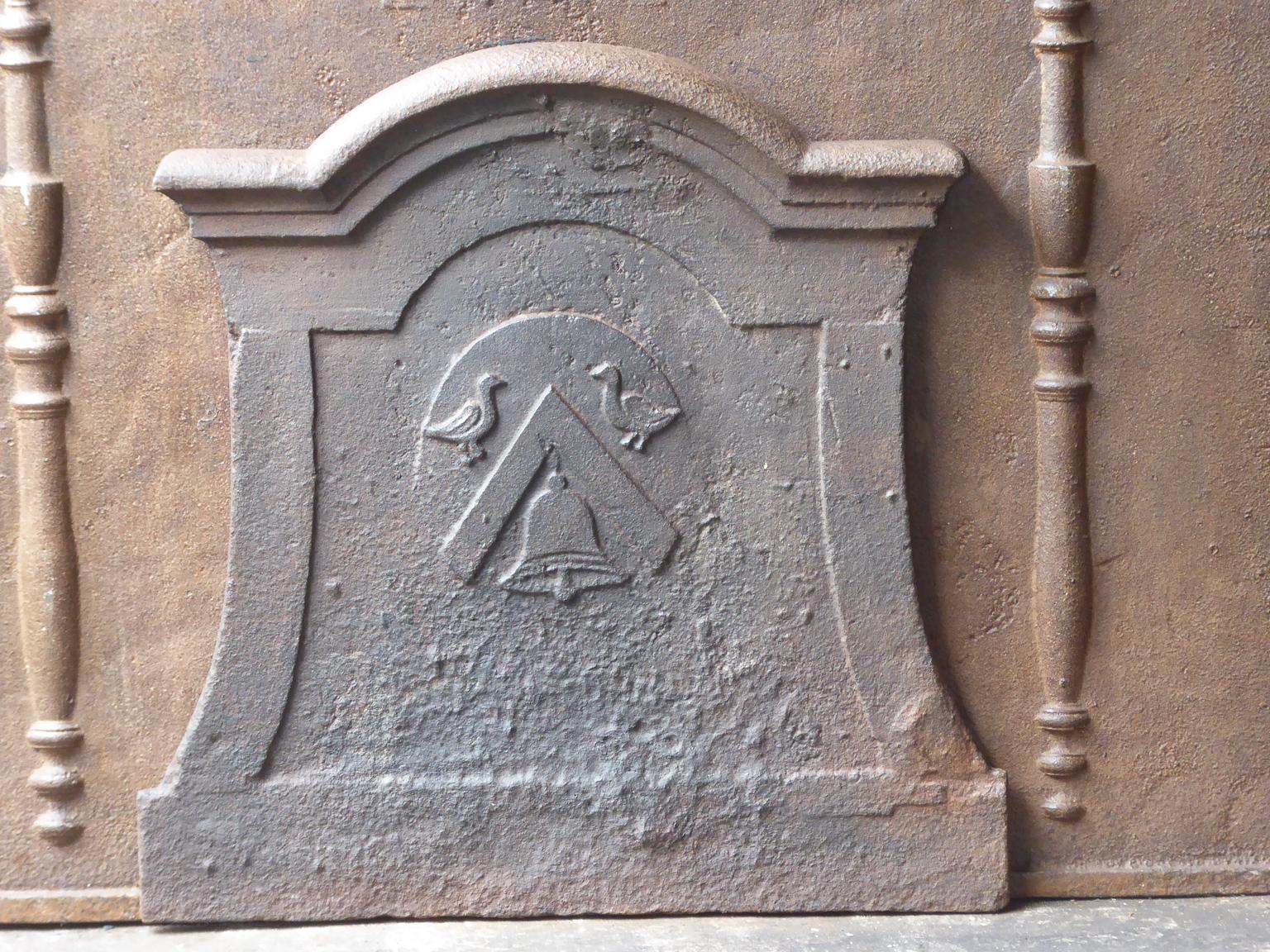 17th-18th century French Louis XIV fireback with a coat of arms. The fireback is made of cast iron and has a natural brown patina. Upon request it can be made black.







  