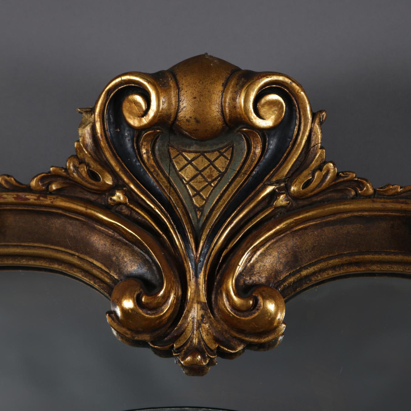 French Louis XIV Ebonized and Carved Giltwood over Mantel Mirror, 19th Century In Good Condition In Big Flats, NY