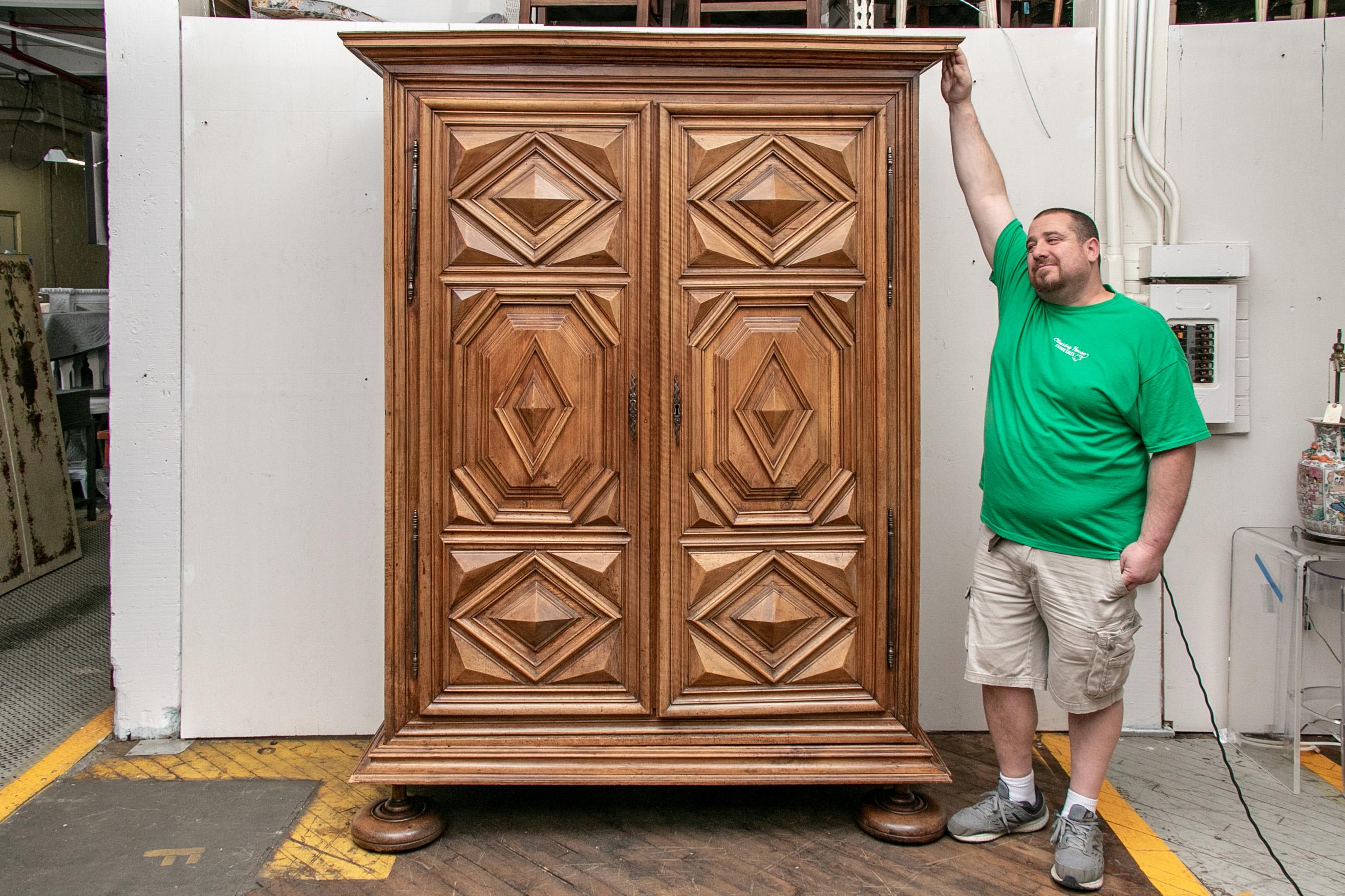 French Provincial French Louis XIV  Era Carved Walnut Cabinet from Burgundy, France