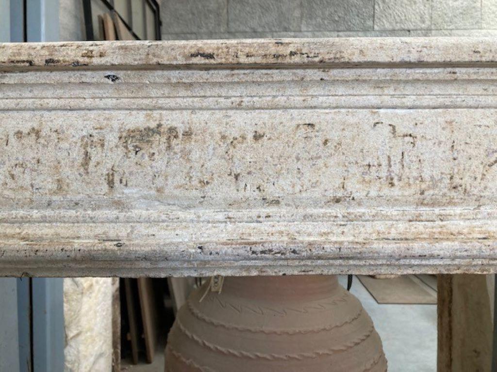 French Limestone Fireplace Mantel with beautiful patina, dating from the 18th Century