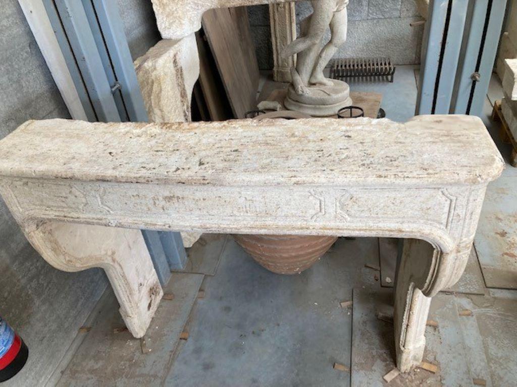 Hand-Carved French Louis XIV Limestone Fireplace Mantel For Sale