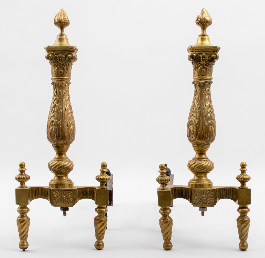 French Louis XIV manner pair of chenets / andirons in gilt brass. Measures: 24