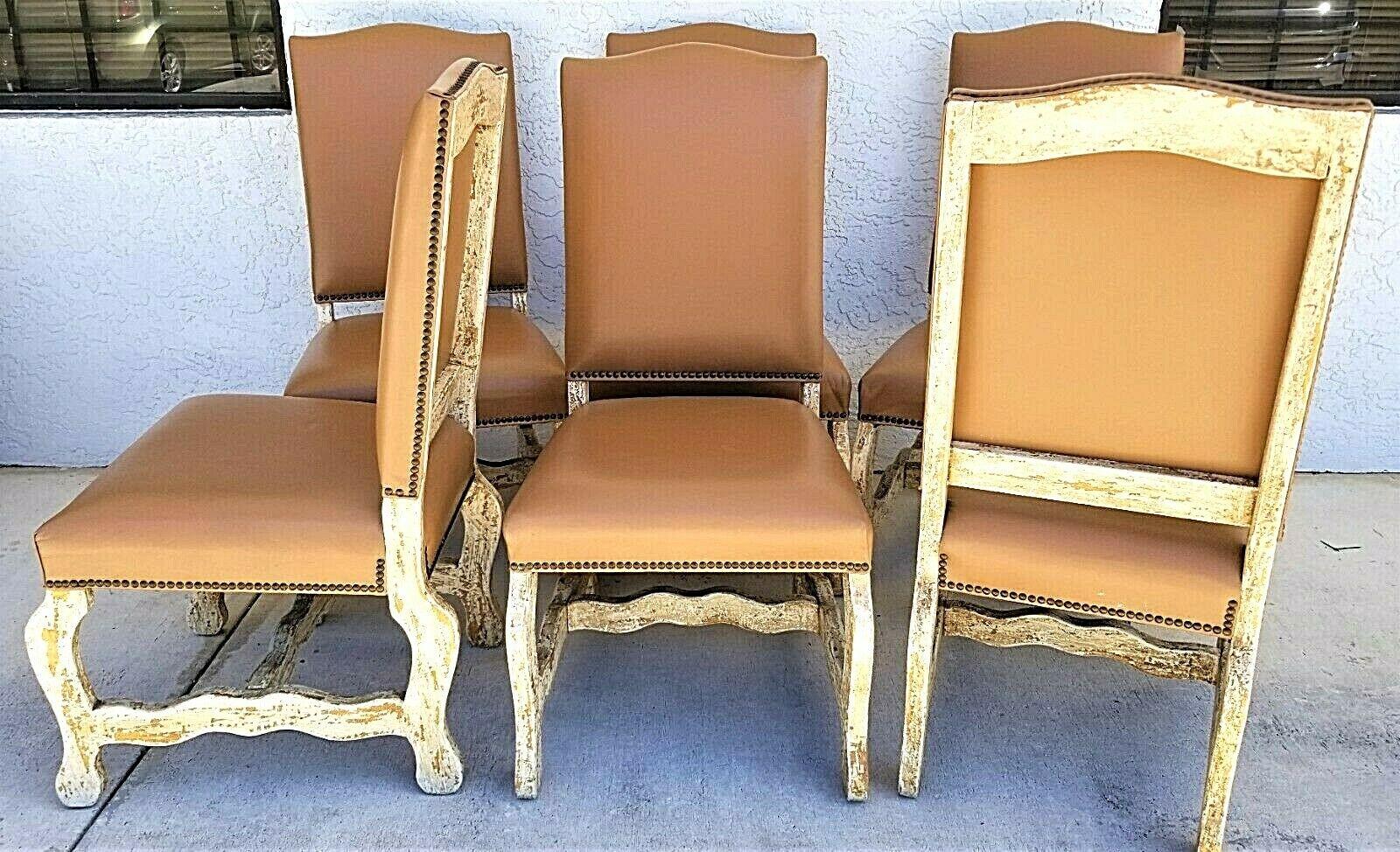 Offering One Of Our Recent Palm Beach Estate Fine Furniture Acquisitions Of A 
Set of (6) Genuine Leather Wood Dining Chairs with Brass Nail Trim

Approximate Measurements in Inches
43