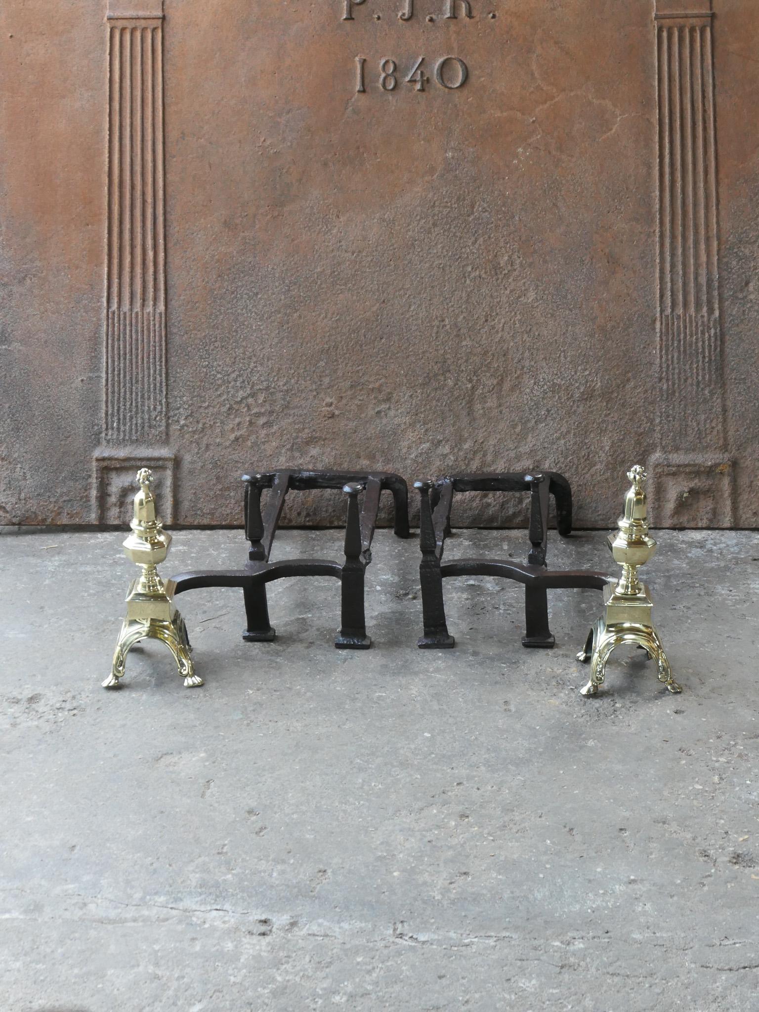 17th century French Louis XIV period fire grate or andirons. Made of beautifully forged wrought iron and polished brass. The condition is good.

Width at front is 68.5 cm (27.0 inches).





  