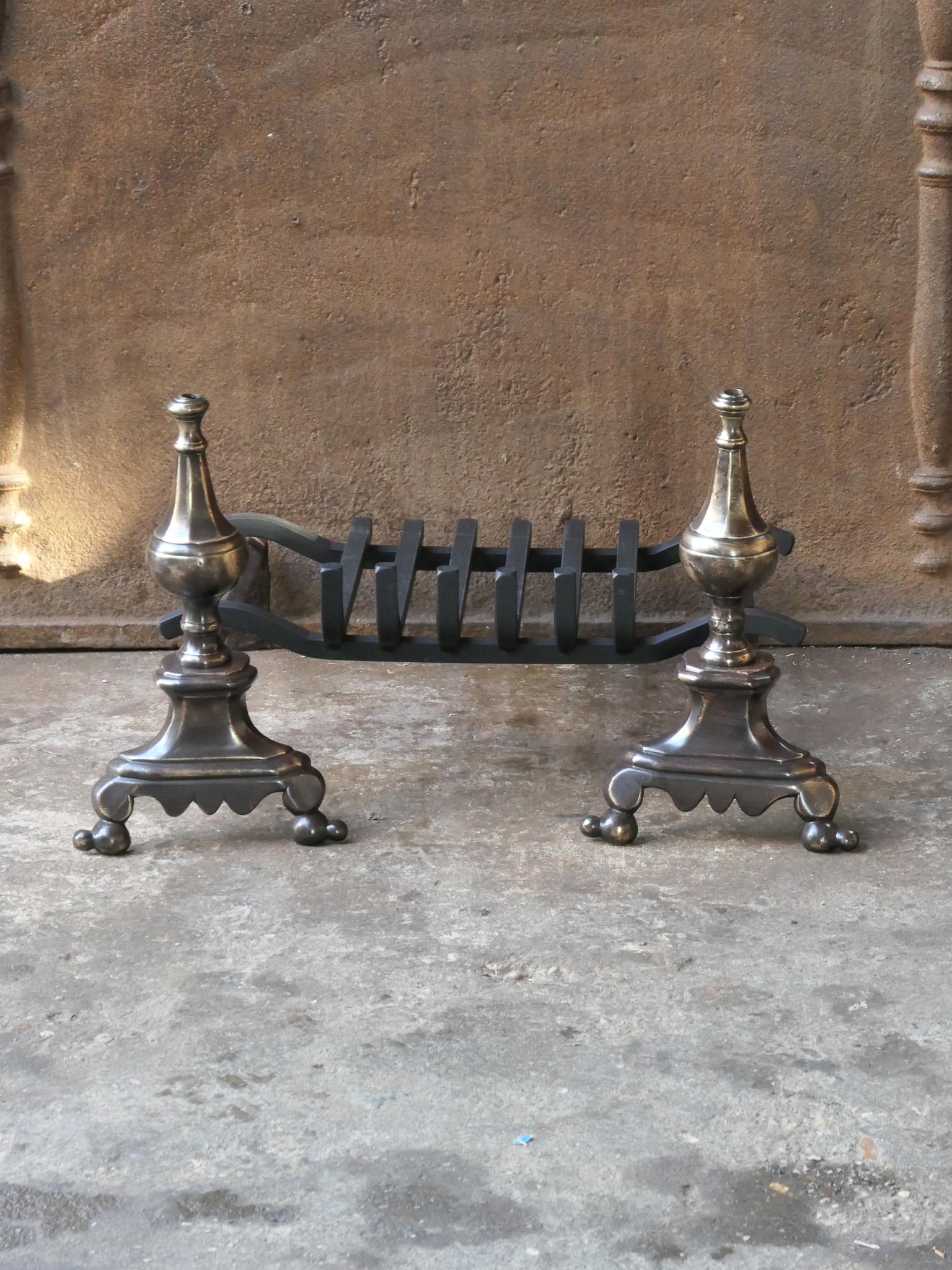 17th century French Louis XIV period andirons made of bronze and forged iron with a newly forged grate. The condition is good.






  