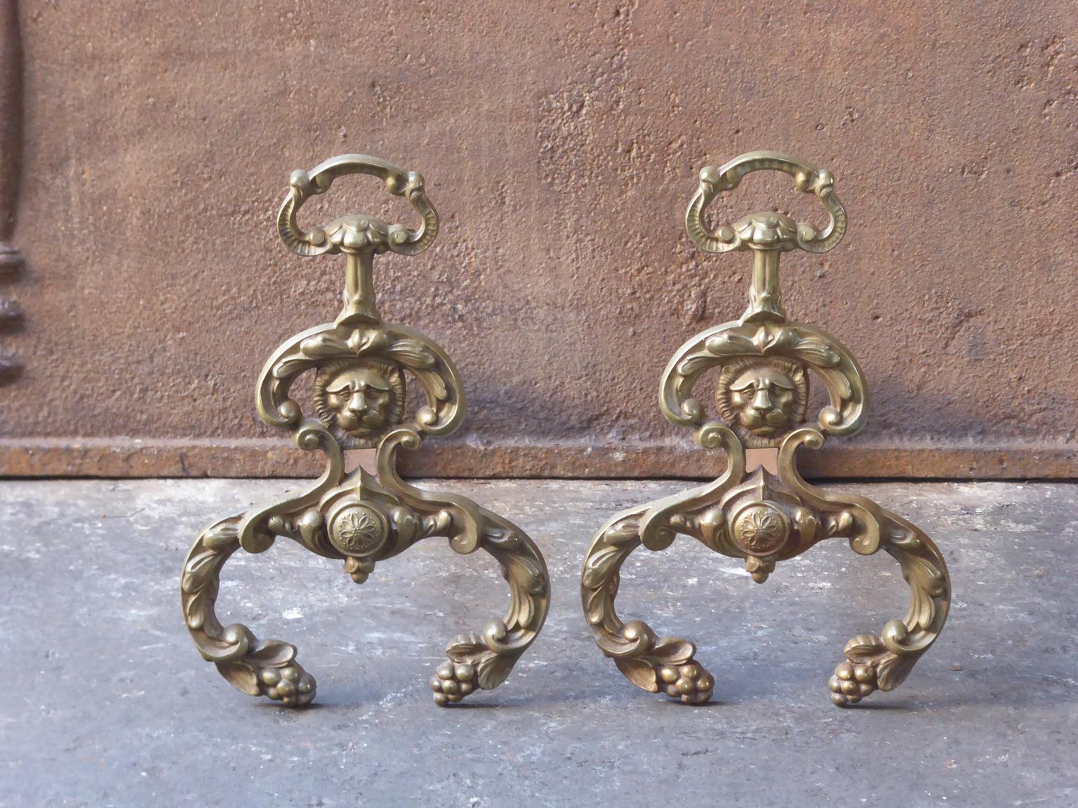 20th century French Louis XIV style andirons made of brass and wrought iron.







   