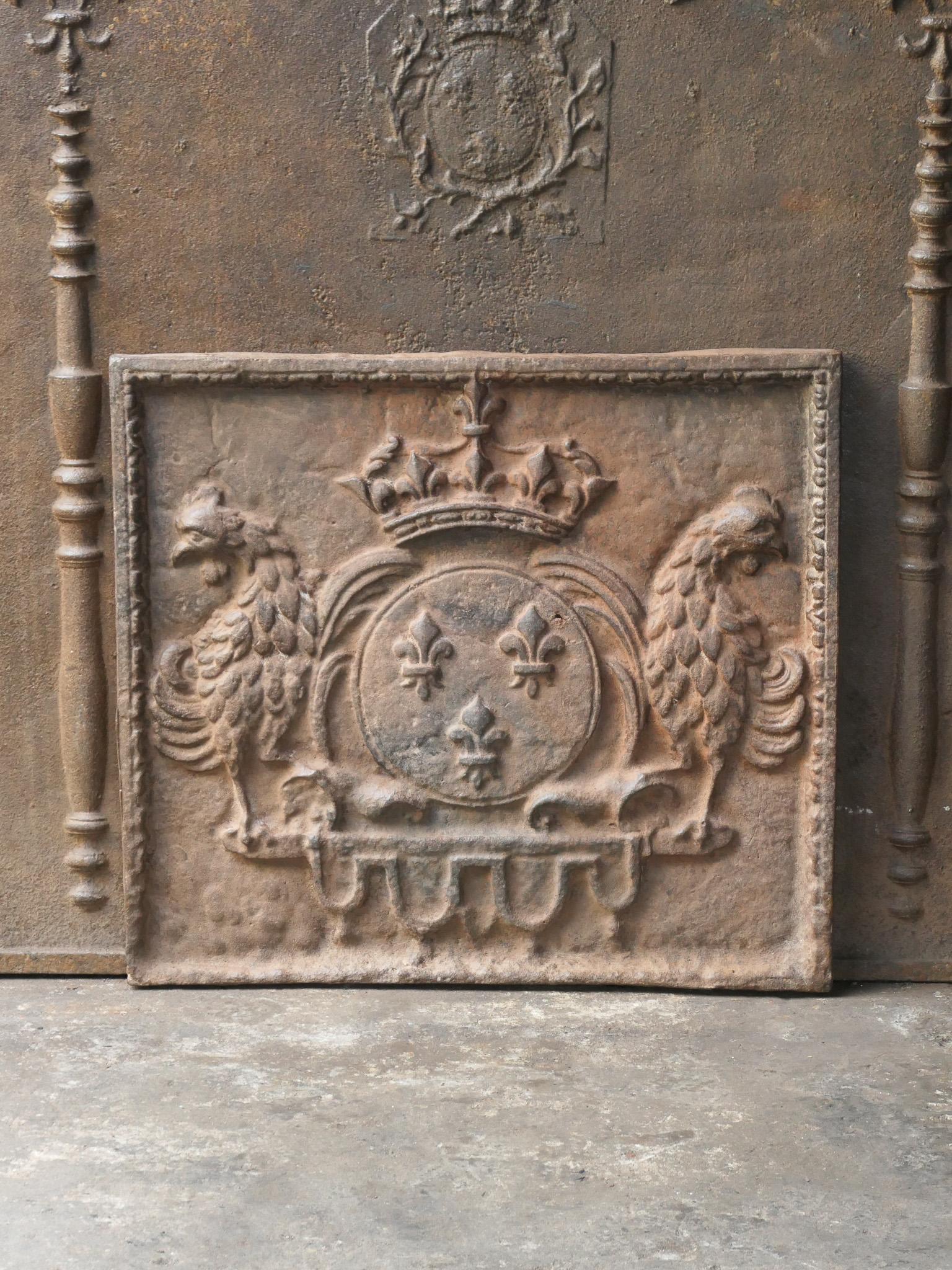 20th century French Louis XIV style fireback with the Arms of France. A coat of arms of the House of Bourbon, an originally French royal house that became a major dynasty in Europe. The house delivered kings for Spain (Navarra), France, both