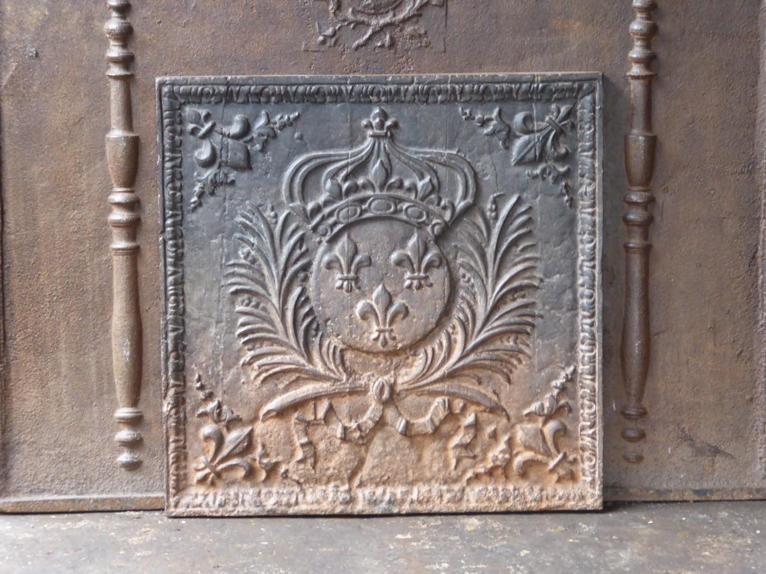 20th Century French Louis XIV style fireback with the arms of France. Coat of arms of the House of Bourbon, an originally French royal house that became a major dynasty in Europe. It delivered kings for Spain (Navarra), France, both Sicilies and