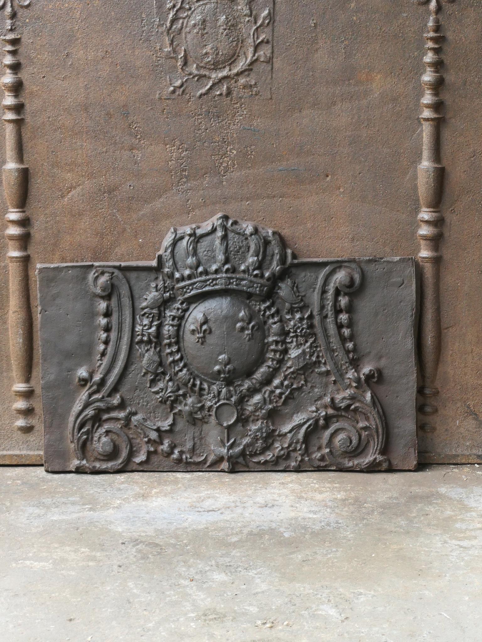 20th Century French Louis XIV style fireback with the arms of France. Coat of arms of the House of Bourbon, an originally French royal house that became a major dynasty in Europe. It delivered kings for Spain (Navarra), France, both Sicilies and