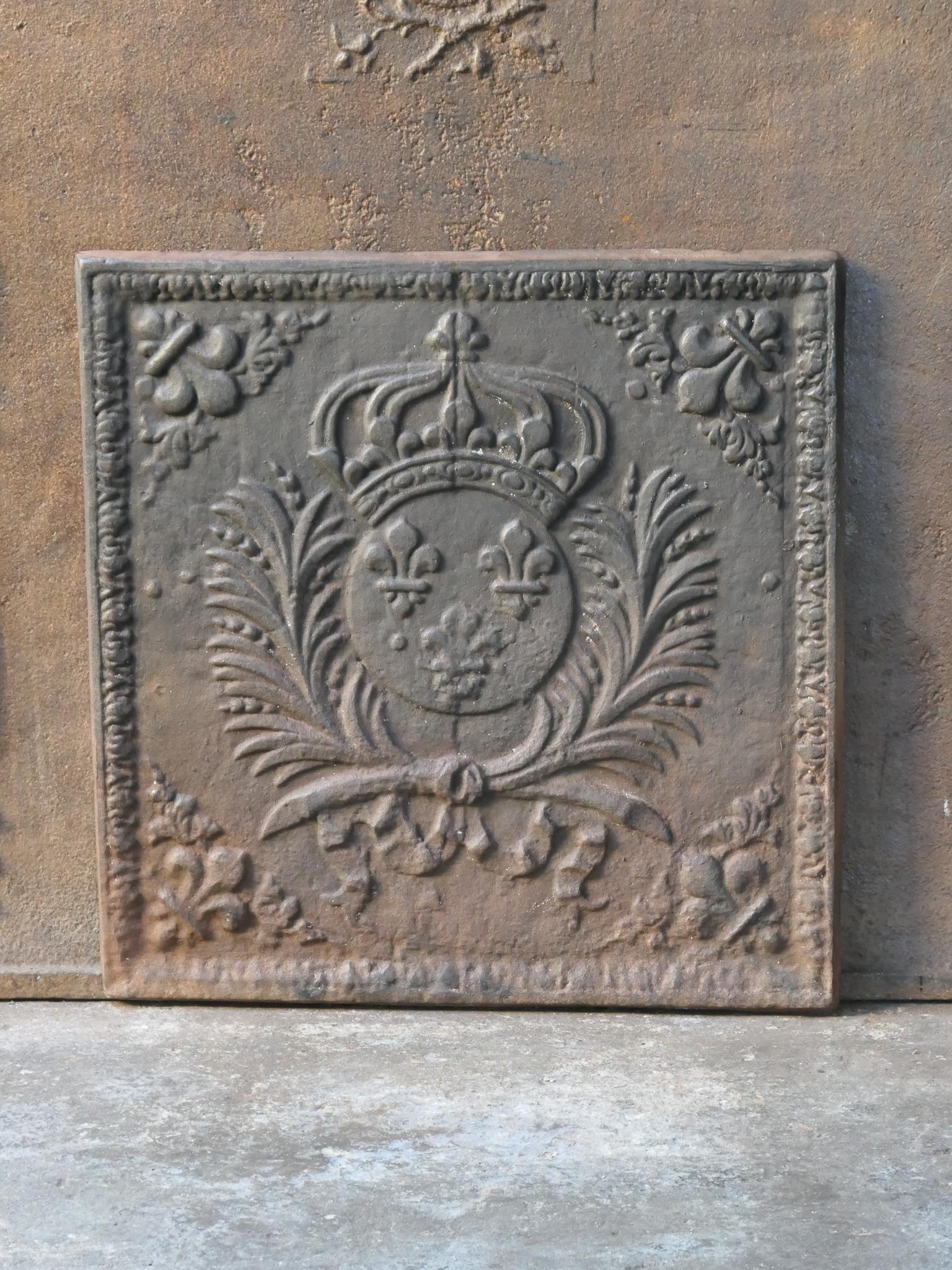 20th century French Louis XIV style fireback with the arms of France. Coat of arms of the House of Bourbon, an originally French royal house that became a major dynasty in Europe. It delivered kings for Spain (Navarra), France, both Sicilies and