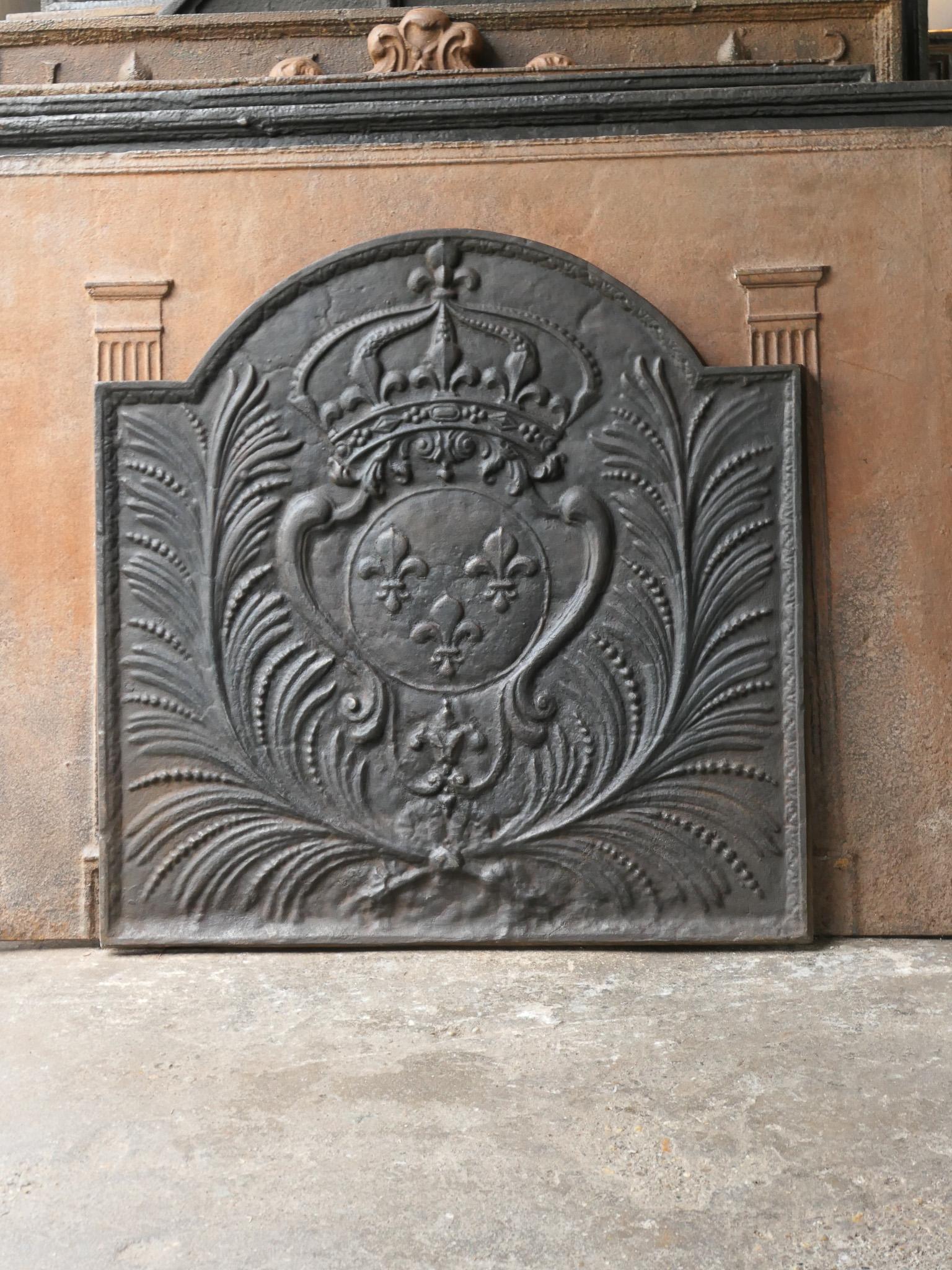 French Louis XIV style fireback with the Arms of France. A coat of arms of the House of Bourbon, an originally French royal house that became a major dynasty in Europe. The house delivered kings for Spain (Navarra), France, both Sicilies and Parma.