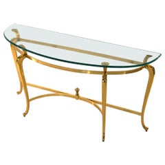 Consolle francese in stile Luigi XIV in metallo dorato e bronzato con piano in vetro 20° secolo