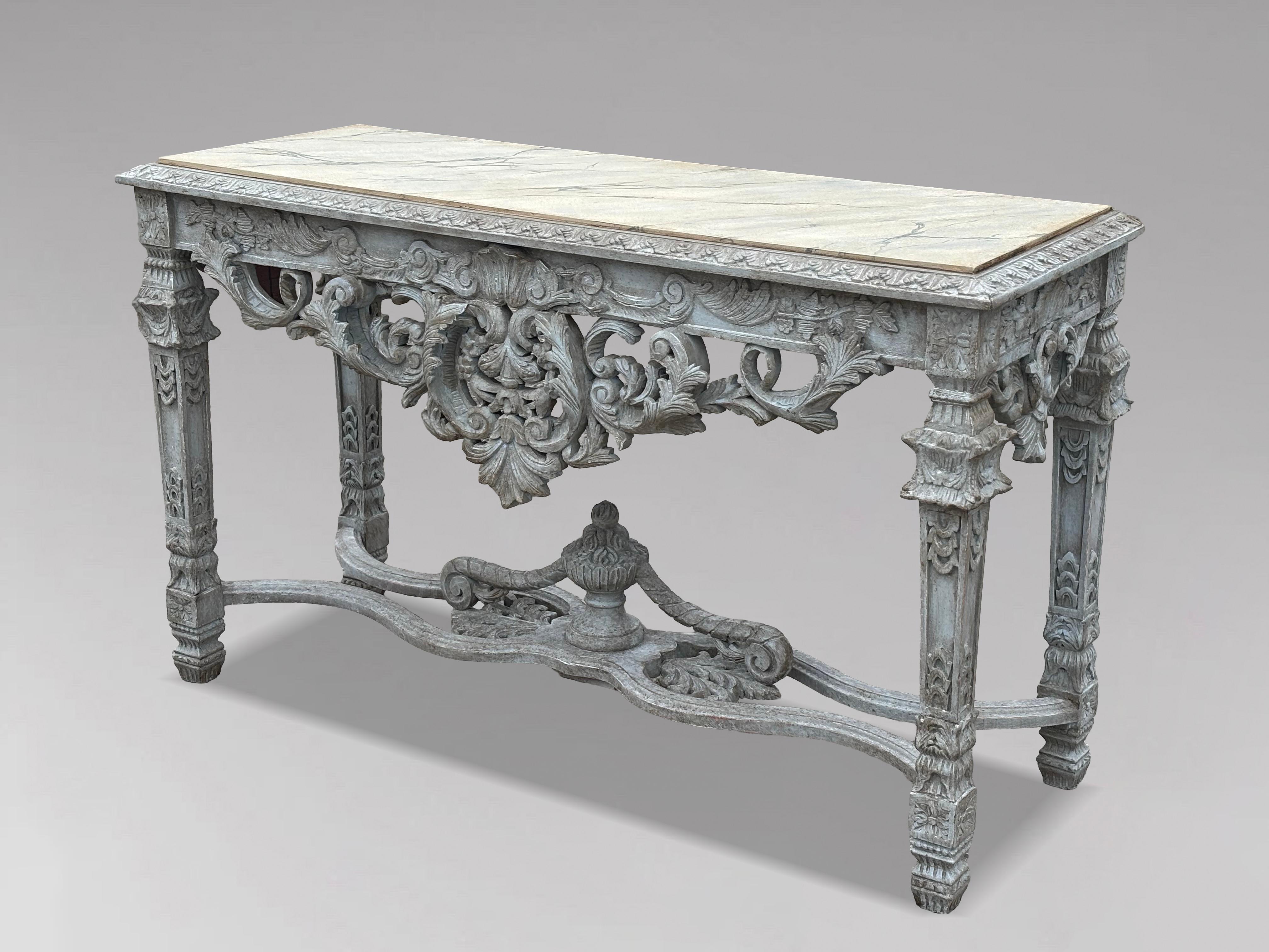 A Very Decorative French Louis XIV Style Carved Painted Faux Marble Top Hall Console Table

A 20th century French Louis XIV style carved painted hall console table, featuring a faux marble top. This stunning piece is raised on fine square foliate