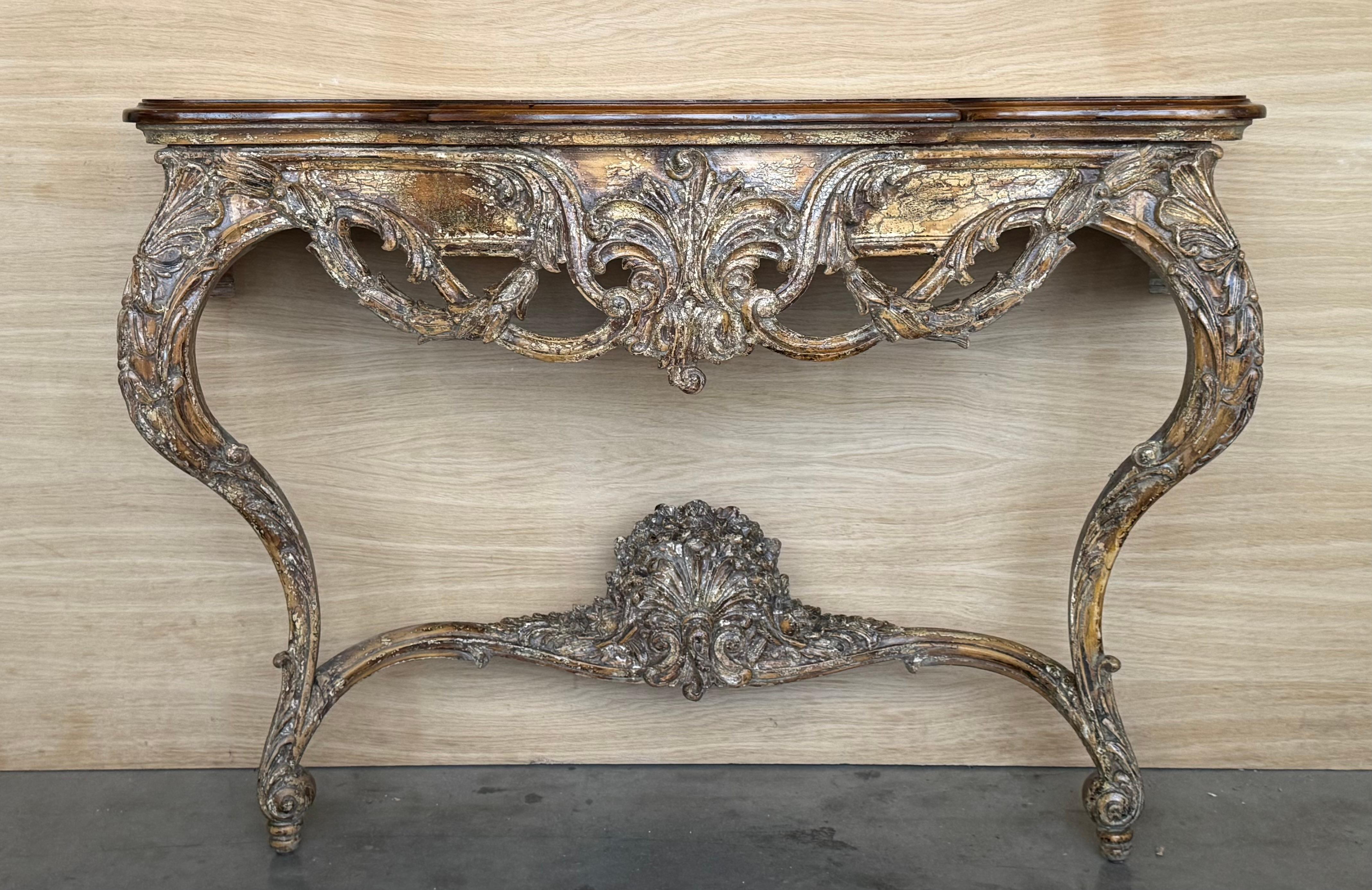 19th Century French Regence Wood Top Console is the perfect way to add timeless elegance to your entryway, hall or any niche! Sculpted from old-growth walnut and left in antic white wood finish, it features lavishly carved shell and foliate designs