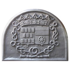 Plaque de cheminée française de style Louis XIV « Armoiries de la famille Rostaing »