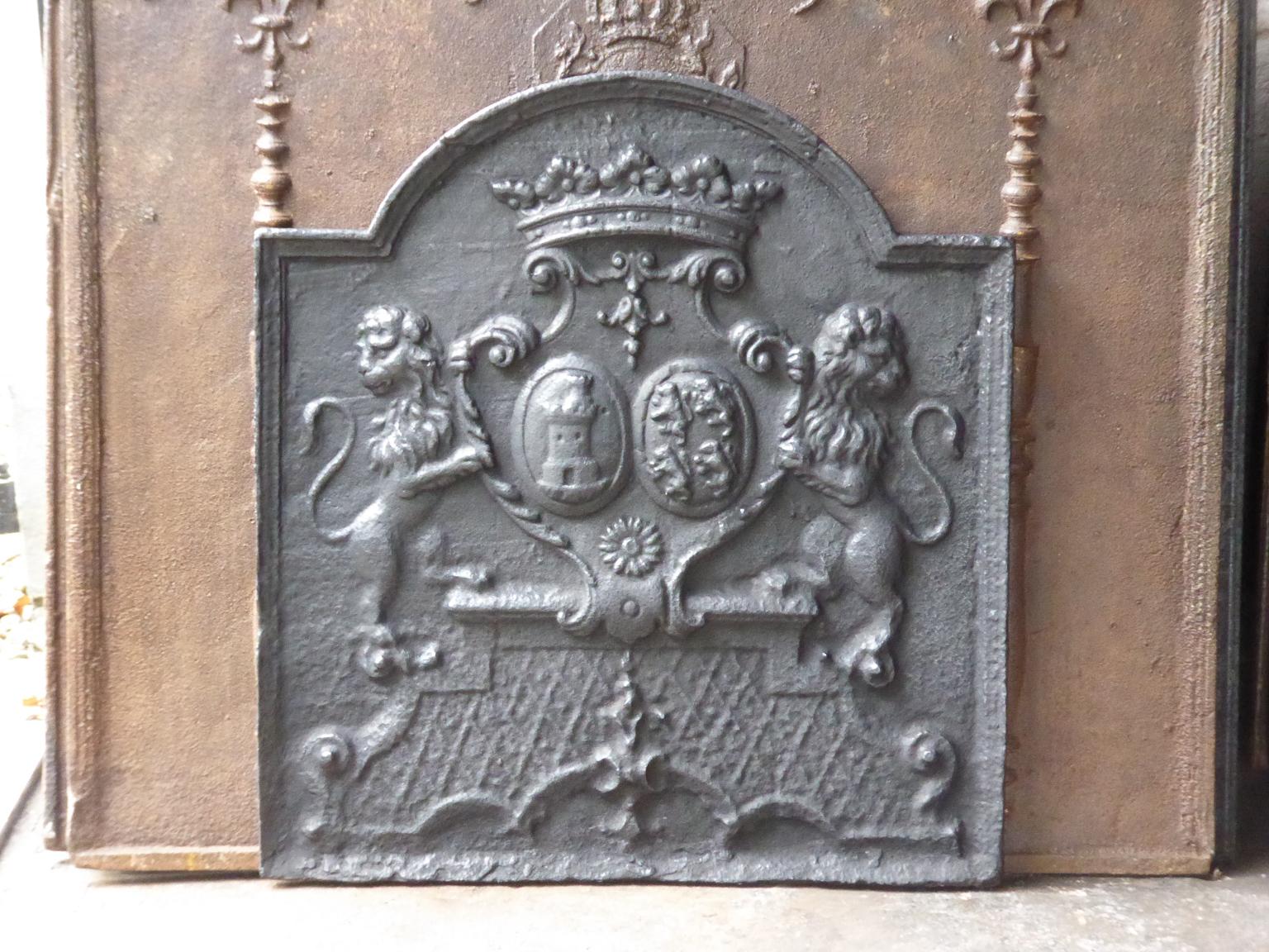 Fireback with the coat of arms of the alliance of Des Salles and Beauvau. Described by P. Palasi ('Plaques de cheminées héraldiques'; item 430).

The fireback is made of cast iron and has a black / pewter patina. It is in a good condition and does