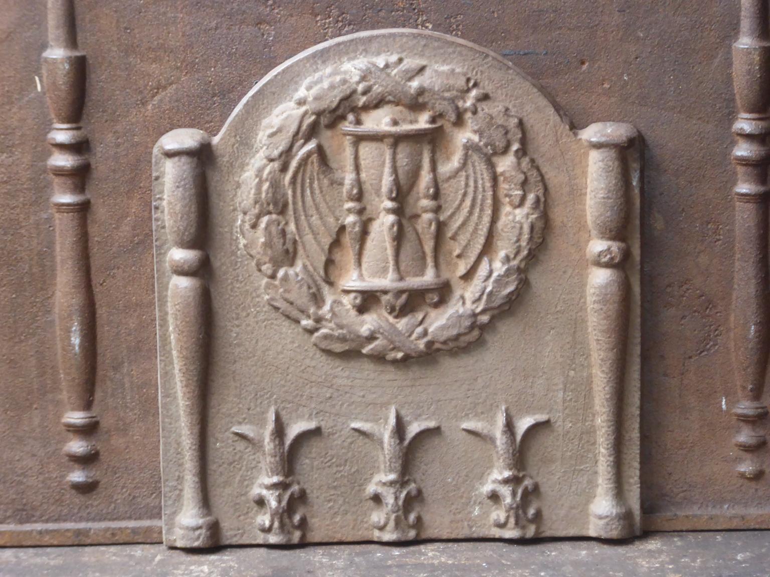 20th century French Louis XIV style fireback with an unknown coat of arms.

The fireback is made of cast iron and has a natural brown patina. Upon request it can be made black / pewter. It is in a good condition and has no cracks.







  