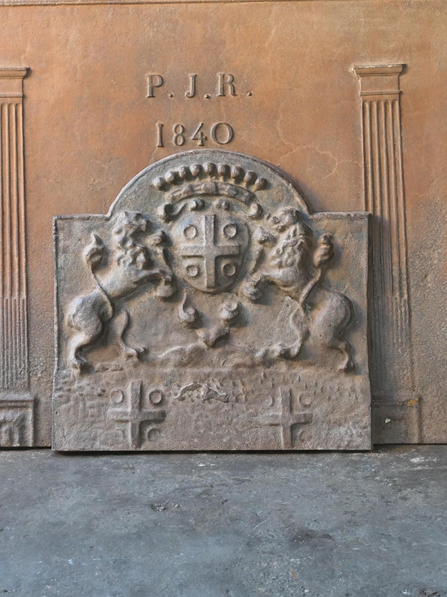 20th century French Louis XV style fireback with a coat of arms.

The fireback is made of cast iron and has a brown patina. Upon request it can be made black / pewter at no extra cost. It is in a good condition, no cracks.

.