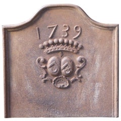 Plaque de cheminée / dosseret "armoiries" de style Louis XIV