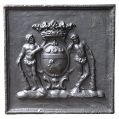 Plaque de cheminée / dosseret aux armoiries de style Louis XIV