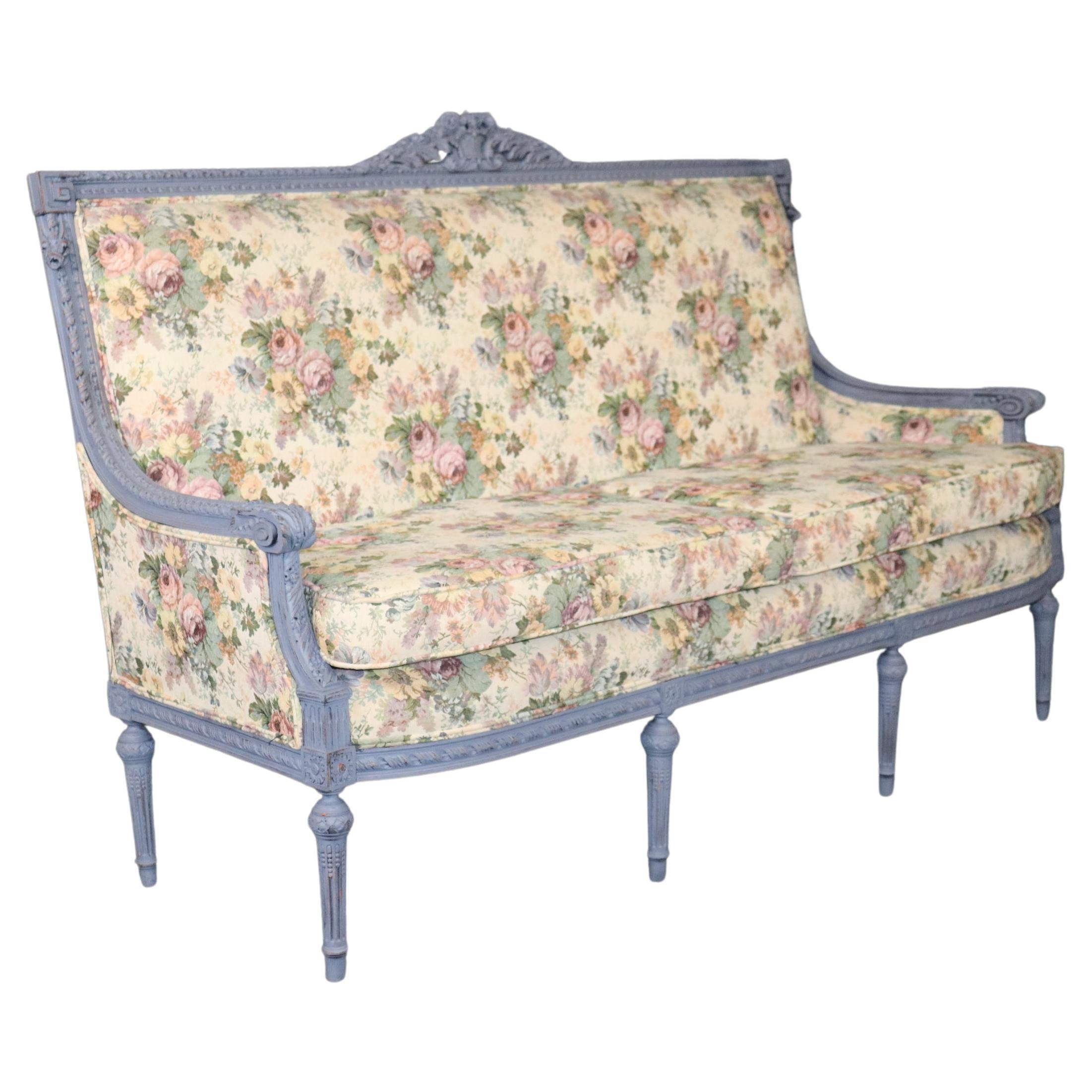 French Louis XIV Style Distressed Paint Decorated Settee With Floral Upholstery For Sale