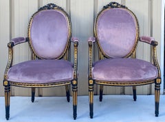 French Louis XIV Style Ebonized and Parcel-Gilt Bergère Chairs, a Pair