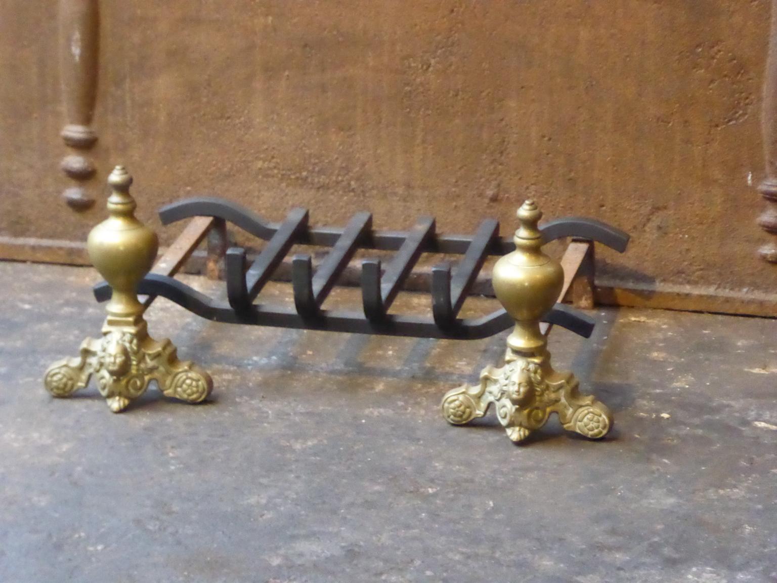 20th century French Louis XIV style fireplace basket - fire basket made of brass and wrought iron. The total width of the front is 20.9 inch (53 cm)

The basket is in a good condition and is fully functional.