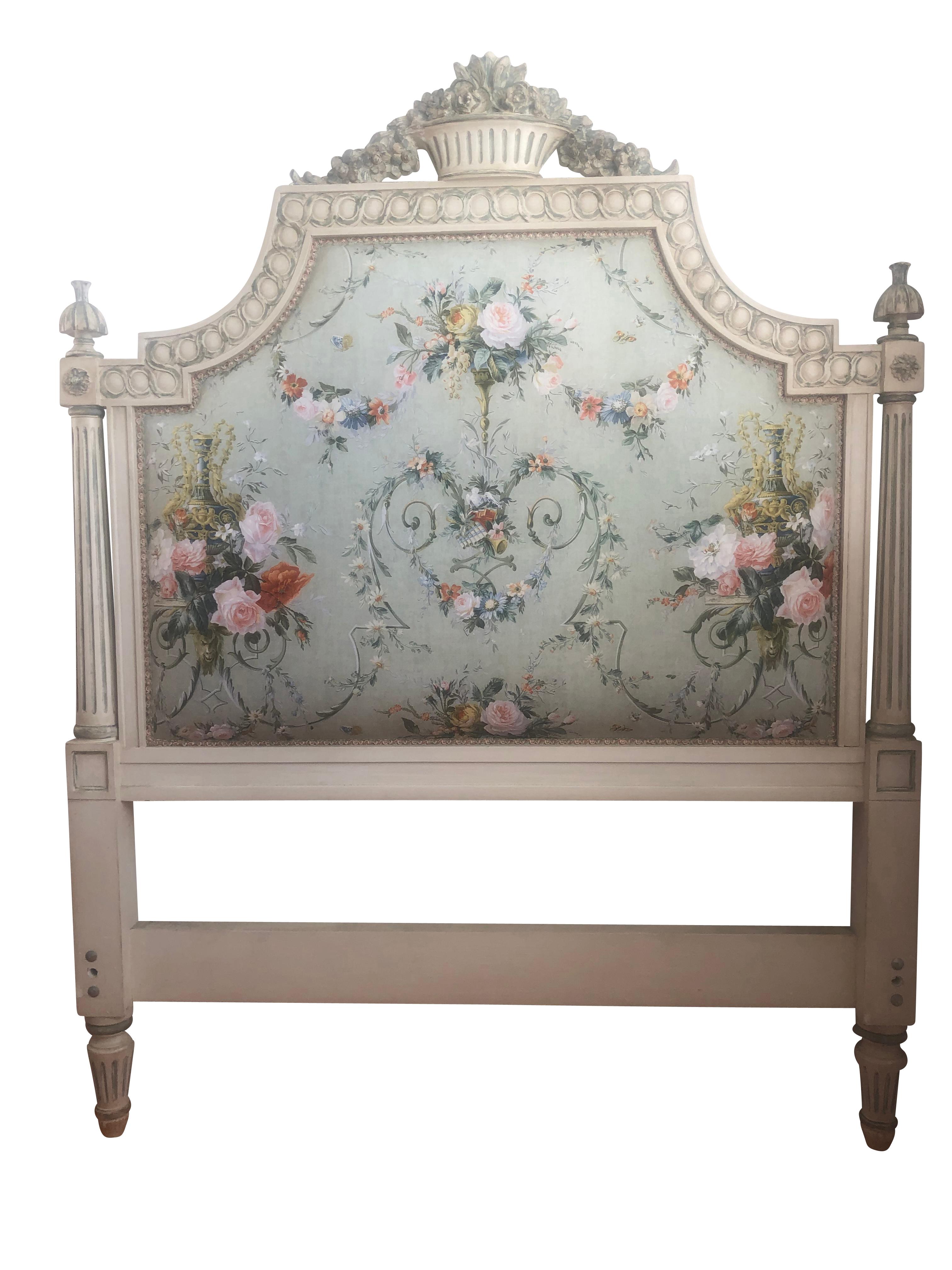 Pair of French Louis XIV style carved twin grey painted headboards perfect for a king size bed with classical polished cotton upholstery. Classical garlands, fruit basket, and egg, and dart decorative carvings. Measures: 54 inches height x 42 inches