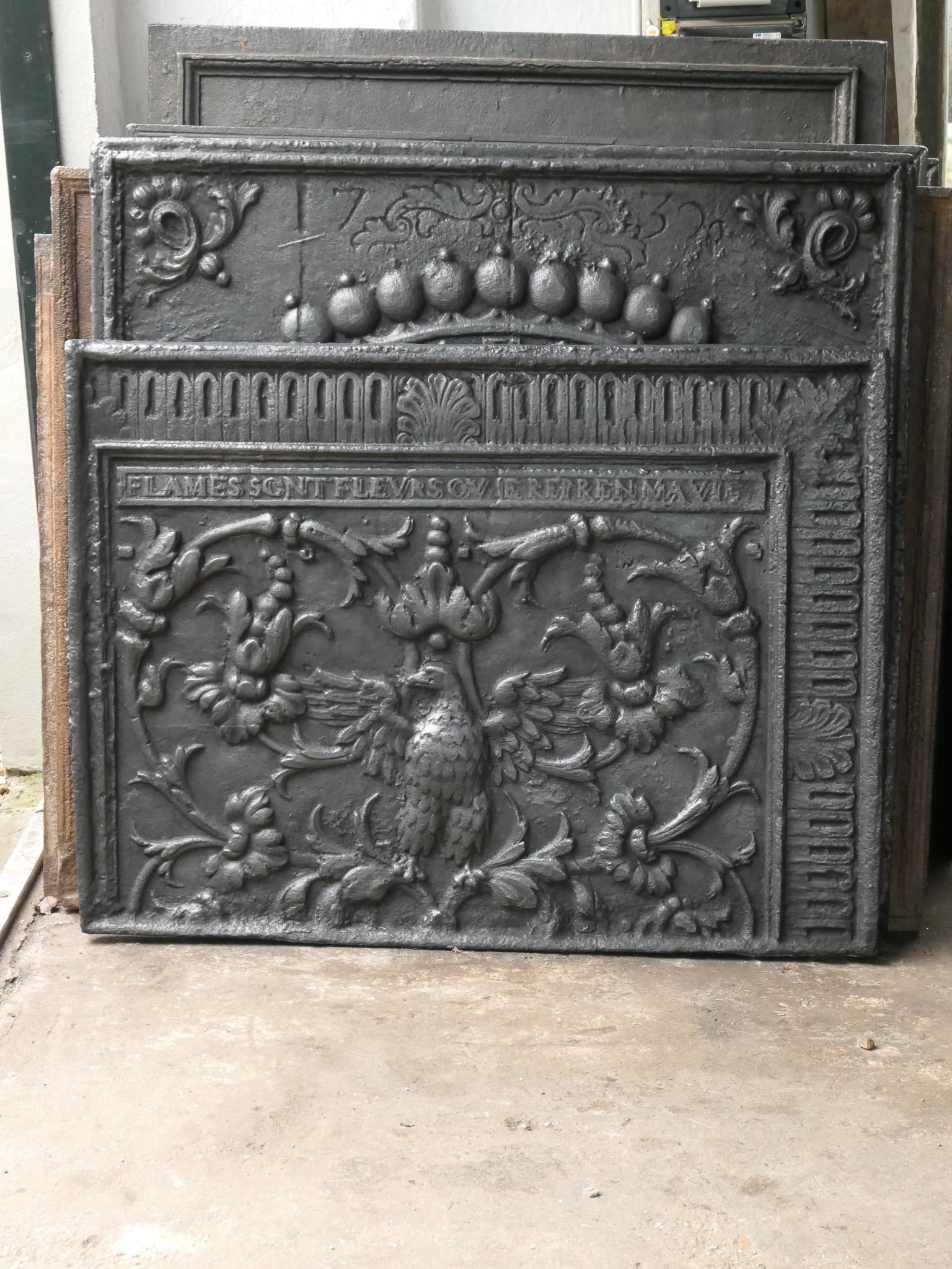 Late 19th-early 20th century French Louis XIV style fireback with a phoenix arising from its ashes. With the text: 