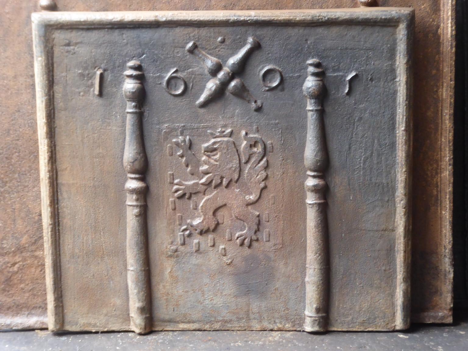 Beautiful 20th century French fireback with a Saint Andrew's cross and two pillars of Hercules. Saint Andrew is said to have been martyred on a cross in this shape. The cross is since then a sign for humility and sacrifice. The pillars of Hercules
