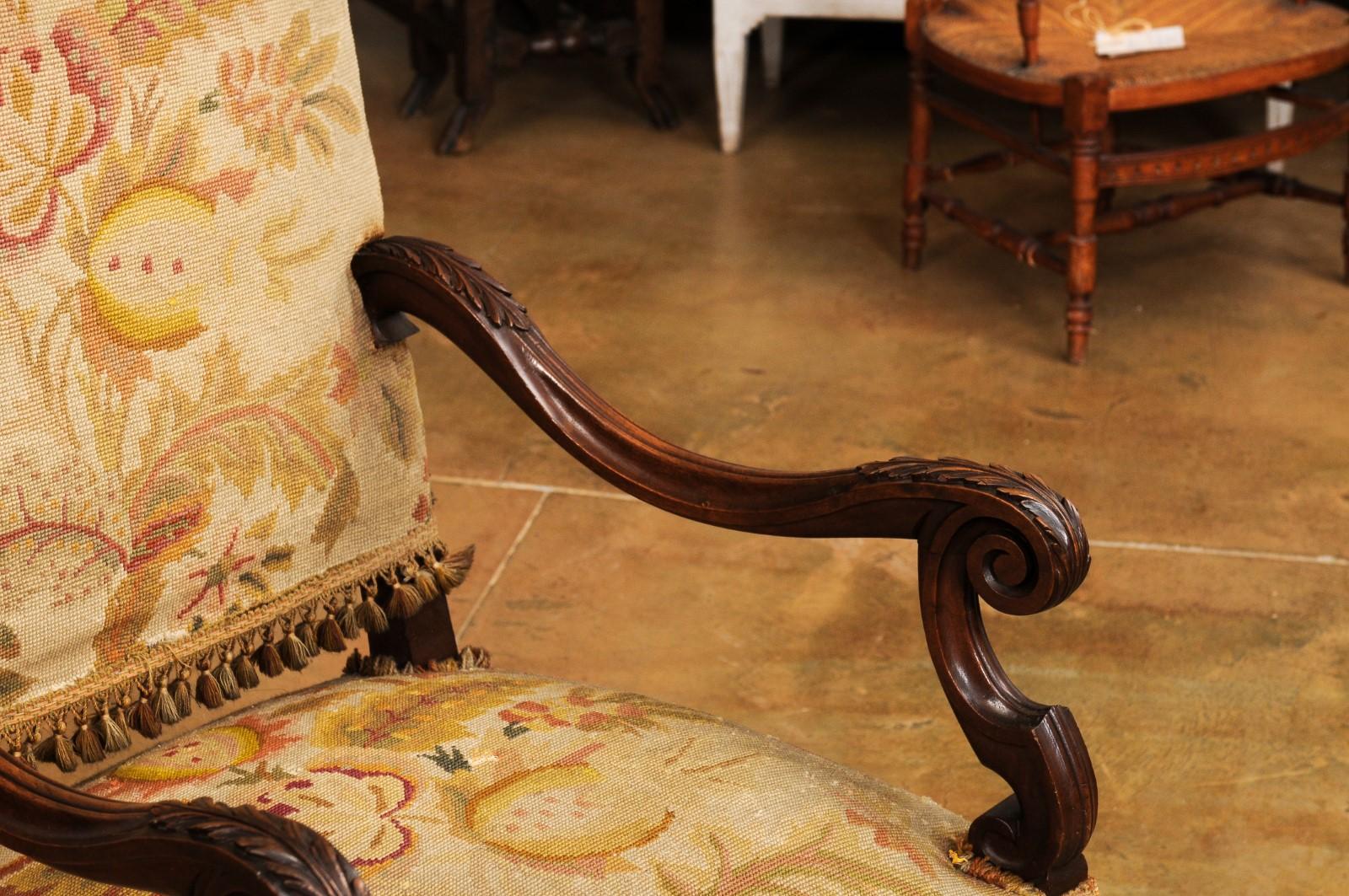 French Louis XIV Style Walnut Fauteuil with Carved Arms and Scrolling Legs For Sale 1
