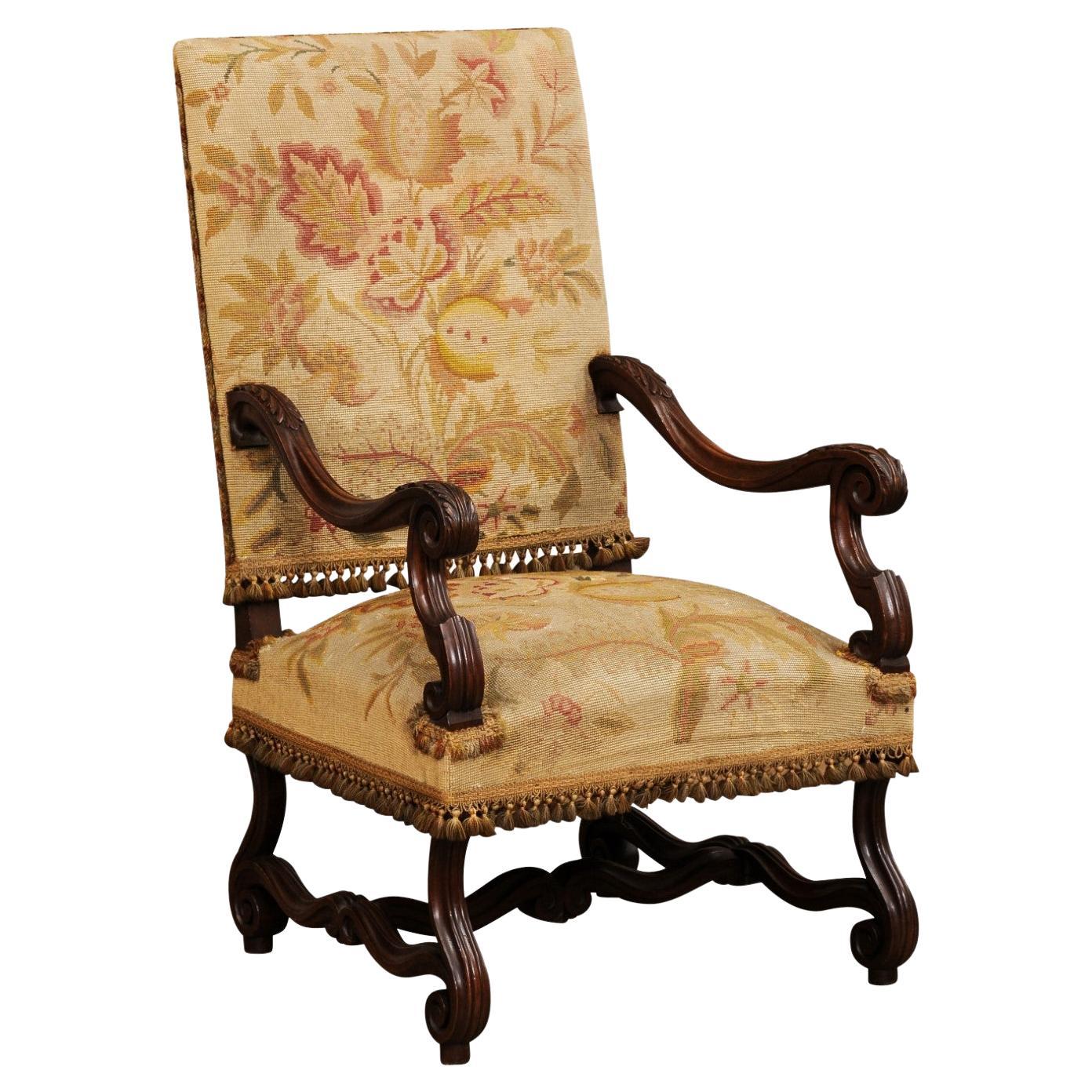 French Louis XIV Style Walnut Fauteuil with Carved Arms and Scrolling Legs For Sale