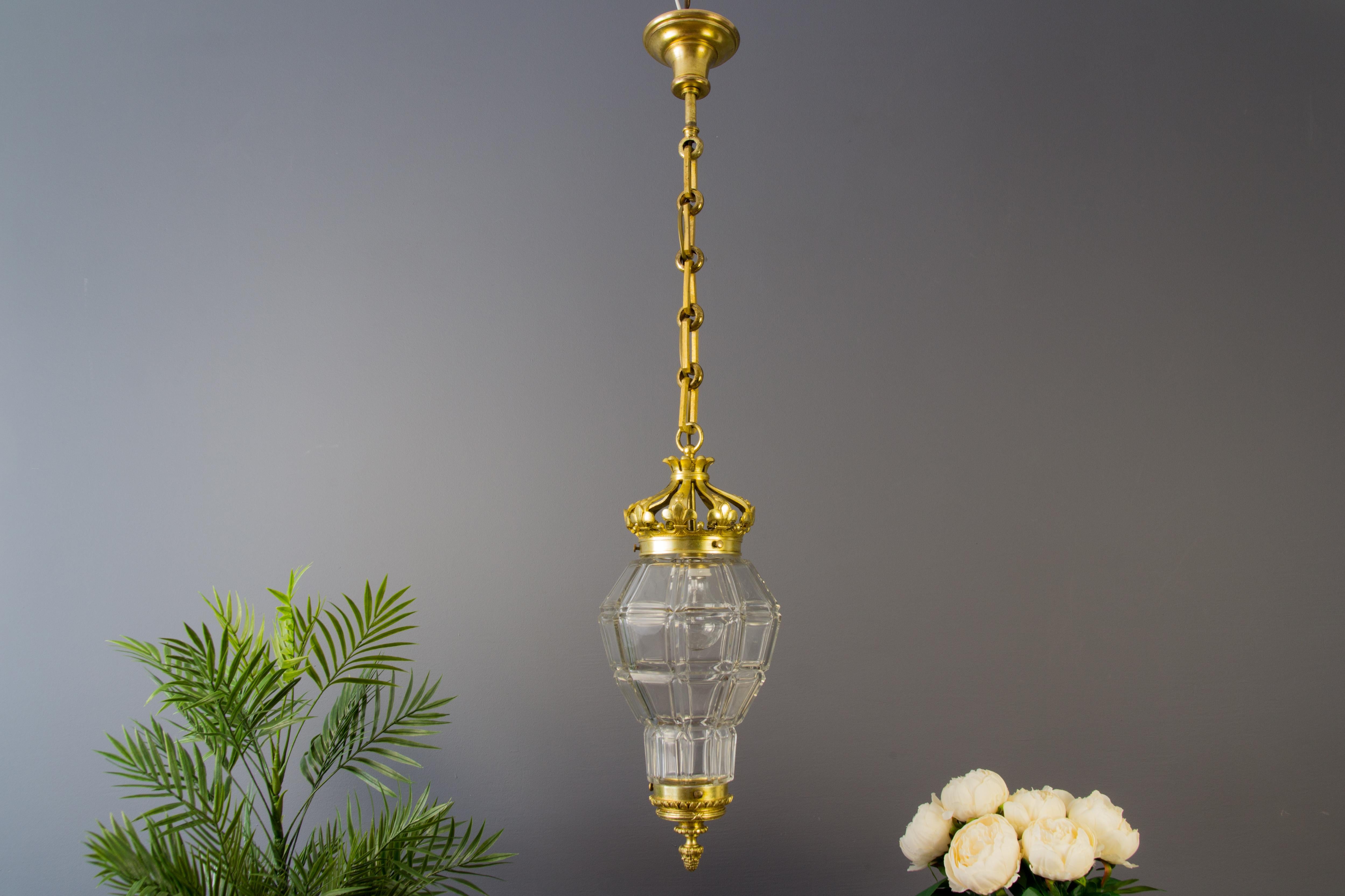 Beautiful French Louis XIV “Versailles” style bronze and clear glass hall lantern, ceiling lamp from the 1920s.
In very good condition. One socket for the E27 (E26) size light bulb.
Measures: Height is 35.43 inches / 90 cm; diameter - 8.26 inches /