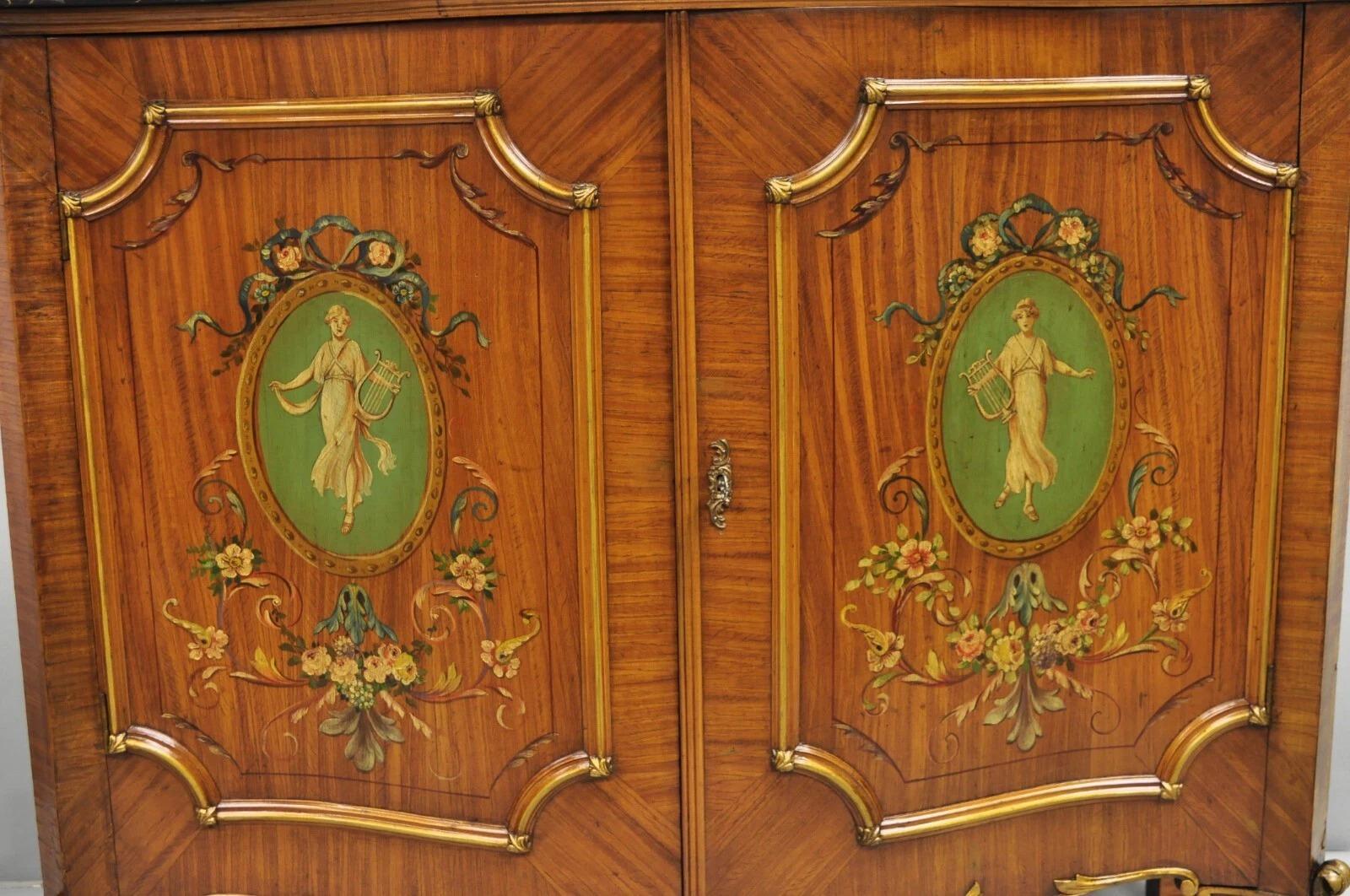 Antique French Louis XV Adam Style Marble Top Kingwood Hand Painted Commode with Drawers. Item features hand painted cameos and flowers throughout with serpentine front and 4 dovetailed drawers, working lock and key. Thick black marble top is