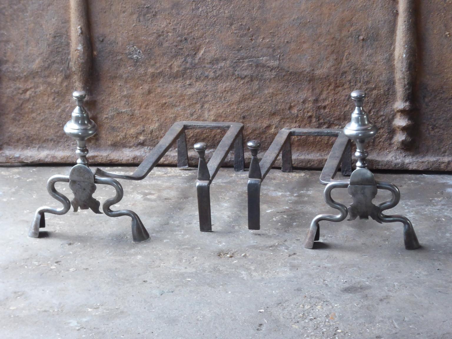 18th century French andirons made of polished steel. The style of the andirons is Louis XV and they are from that period. They are in a good condition.