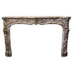 Mantel de mármol francés Luis XV Antique Rouge Royale