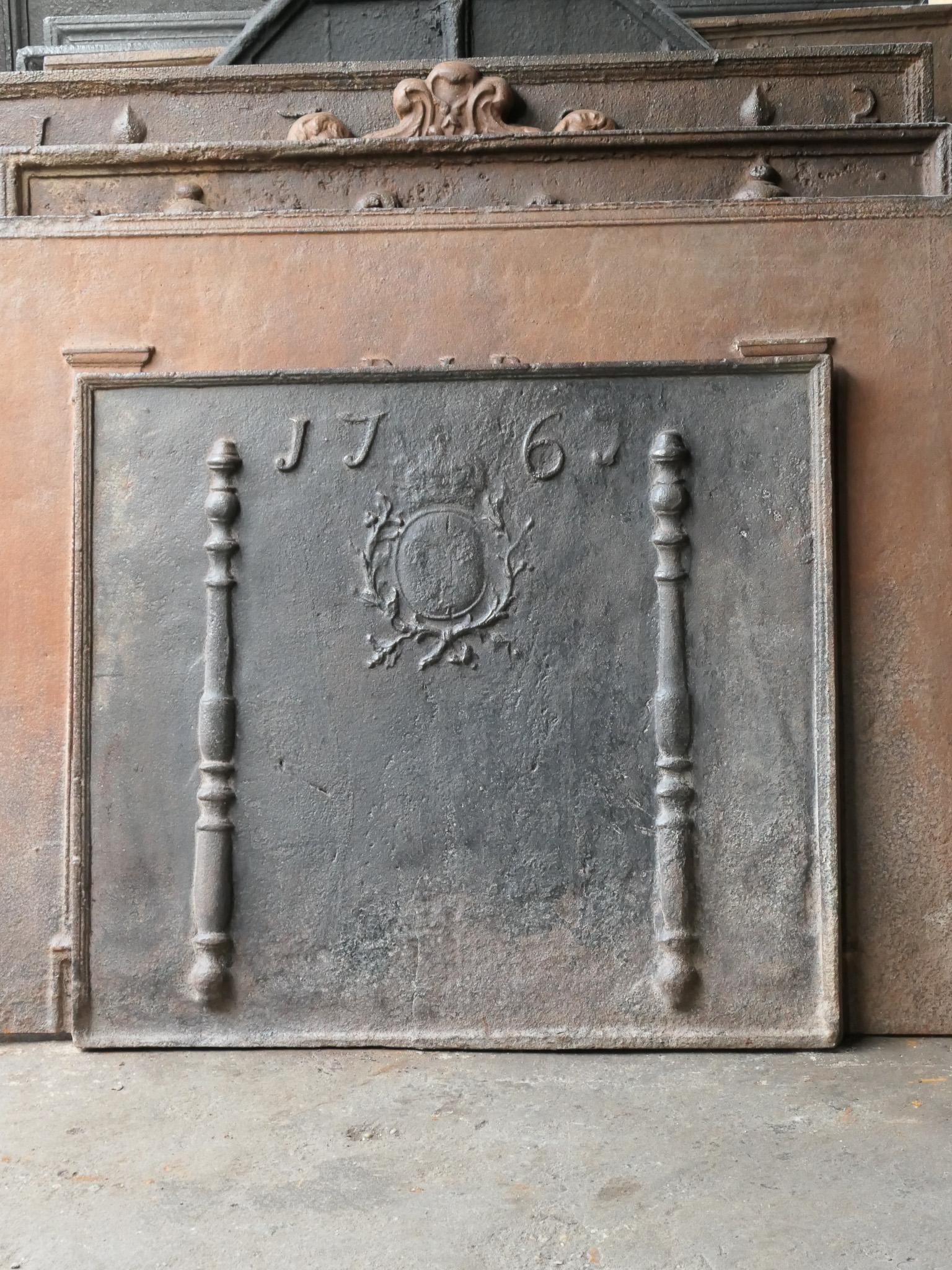 18th century French Louis XV fireback with the arms of France. This is the coat of arms of the House of Bourbon, an originally French royal house that became a major dynasty in Europe. It delivered kings for Spain (Navarra), France, both Sicilies