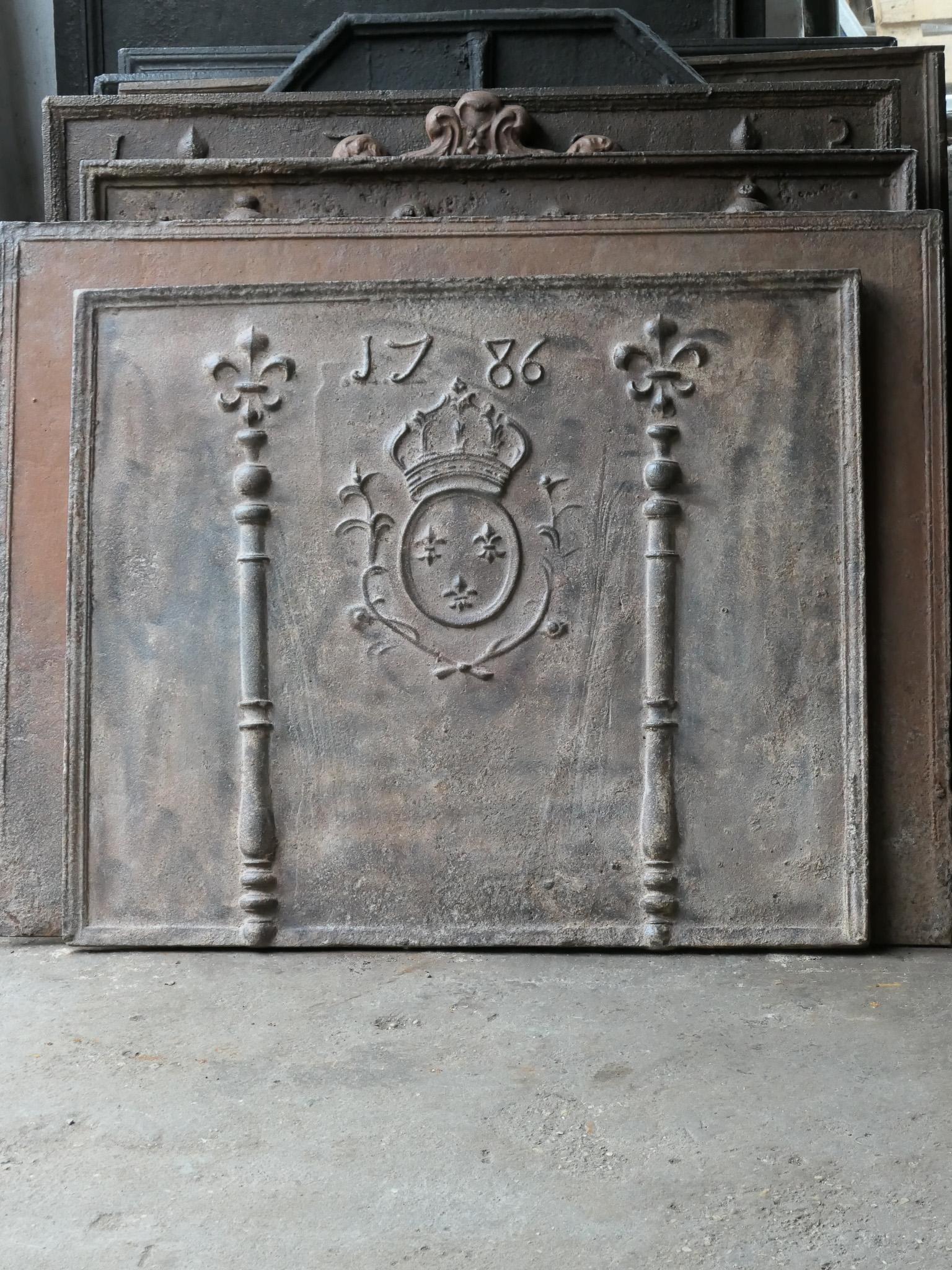 18th century French Louis XV fireback with the arms of France. This is the coat of arms of the House of Bourbon, an originally French royal house that became a major dynasty in Europe. It delivered kings for Spain (Navarra), France, both Sicilies